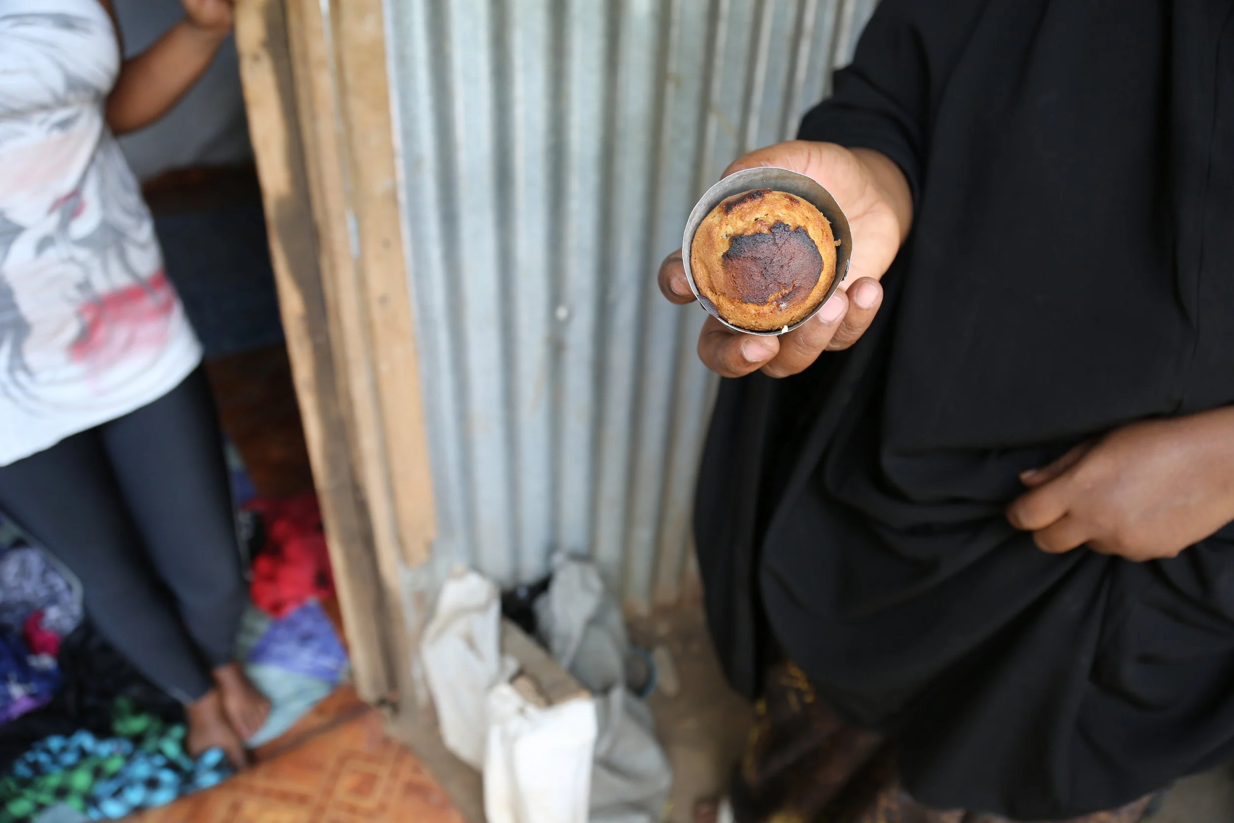 Freshly baked cake

Mariam Nininahazwe holds a cake she baked for a customer in Kakuma refugee camp, supplementing the income she earns from sewing.