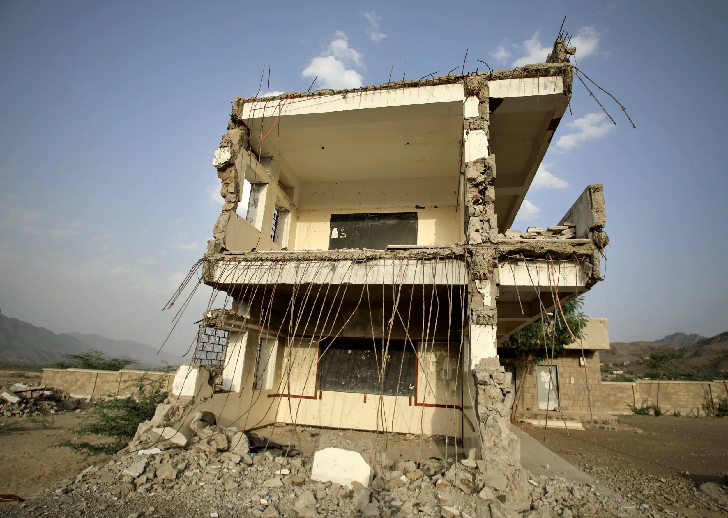 The destroyed side of Al Shaab School in Taiz governorate. Residents say the building was damaged during fighting after armed groups allegedly stored weapons inside the school compound.