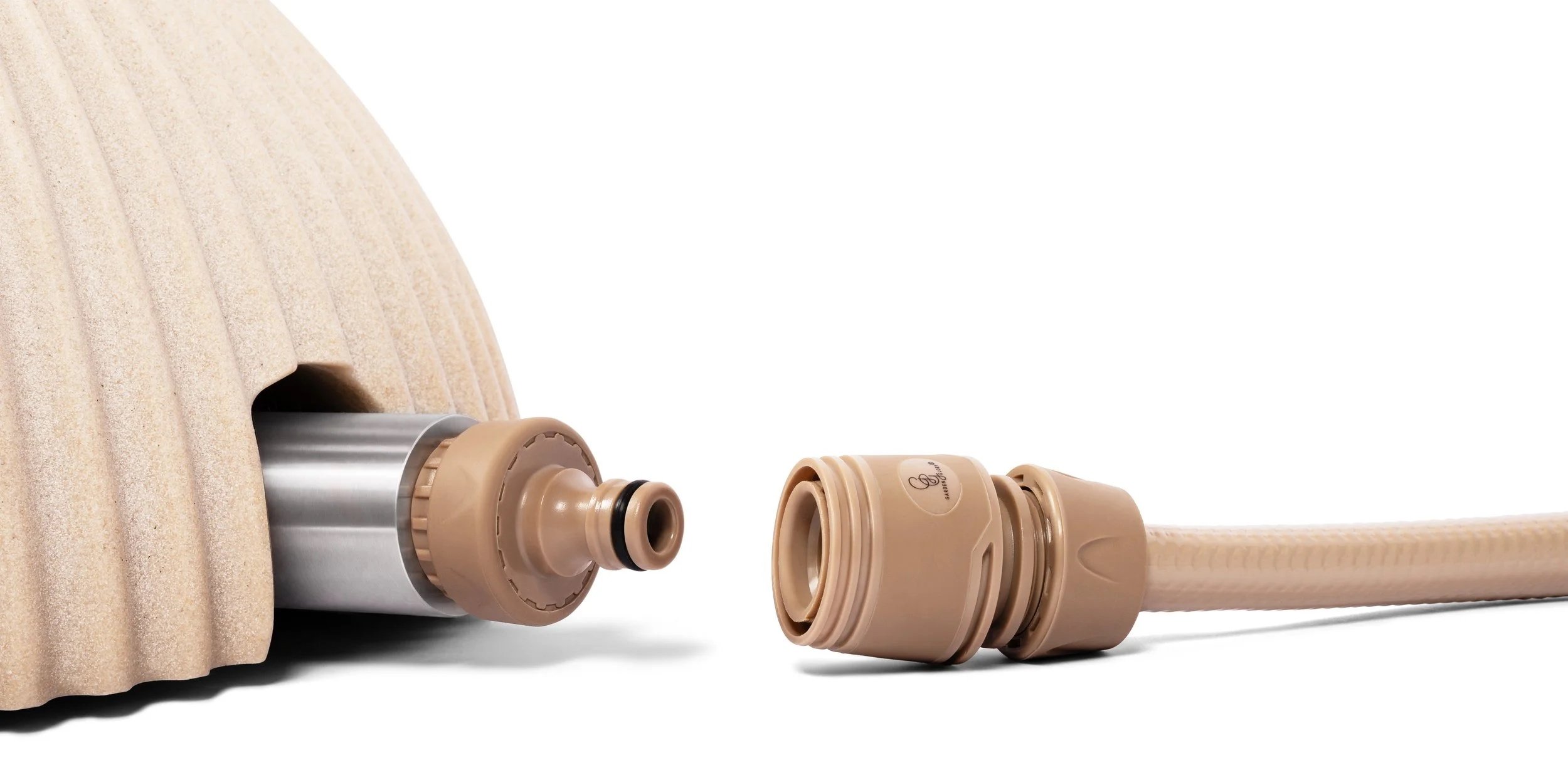 Medical stethoscope with a beige tube and chest piece on white background.