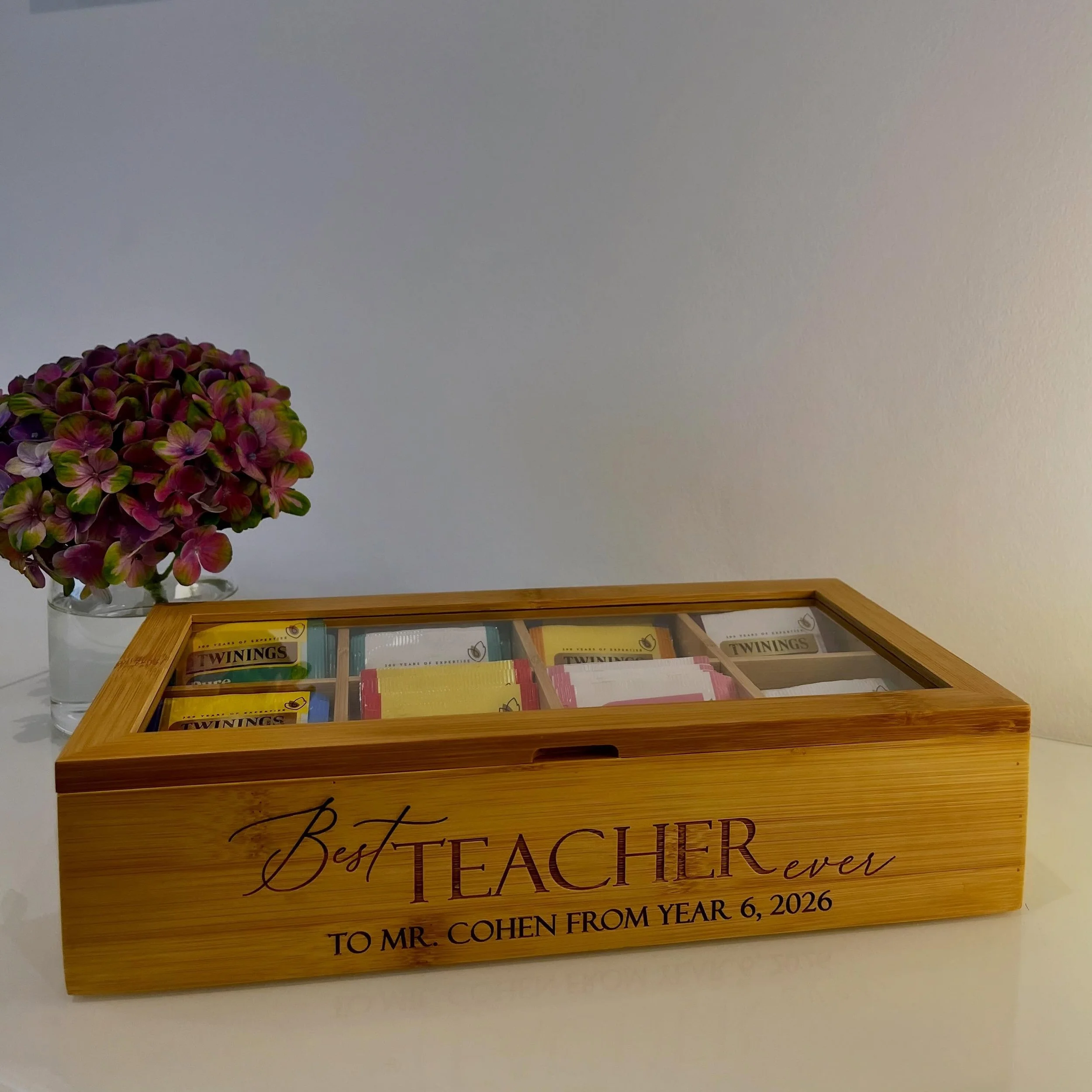 The hostess gift that feels effortlessly luxurious 

Our personalised engraved tea boxes are designed for the homes, staff rooms, and tables that deserve something truly elegant.

Perfect for:
&mdash; Yom Tov hosting
&mdash; End-of-school-year giftin
