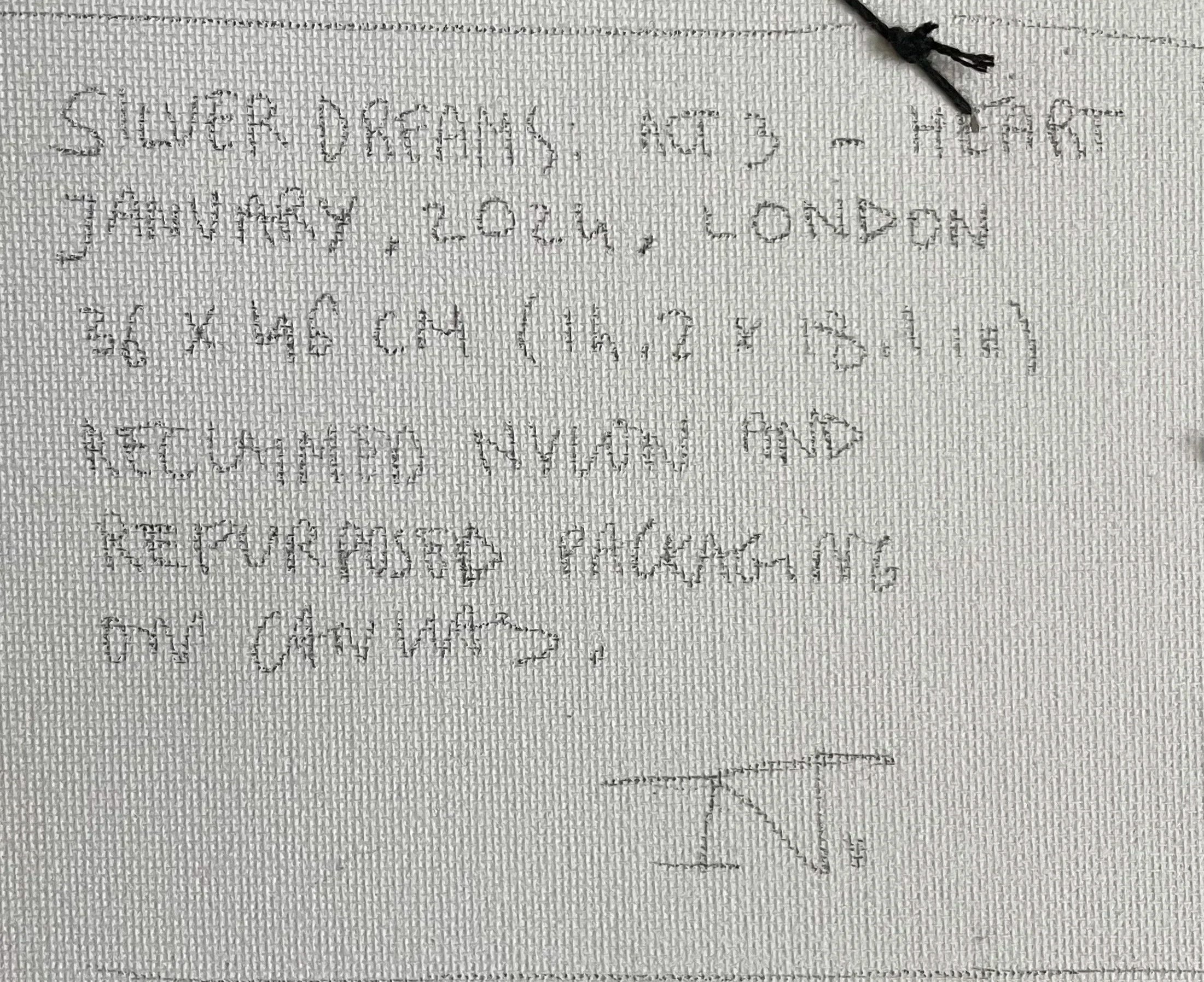 Verso of "Silver Dreams: Act 3 - Heart" by Nicole Bajger; close-up of handwritten provenance, signature, and medium details on canvas.