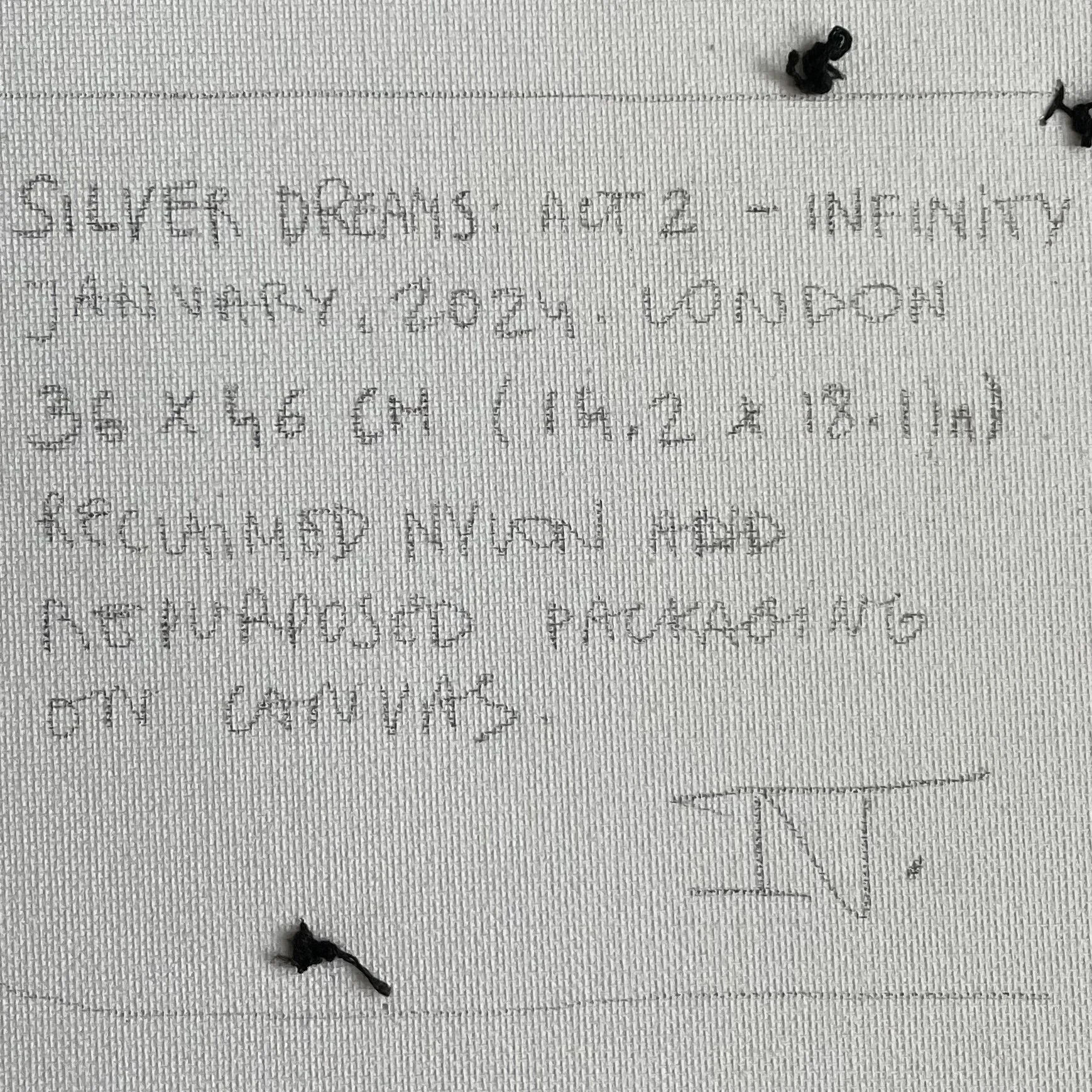 Verso of "Silver Dreams: Act 2 - Infinity" by Nicole Bajger. Close-up of handwritten provenance, signature, and medium details on canvas.