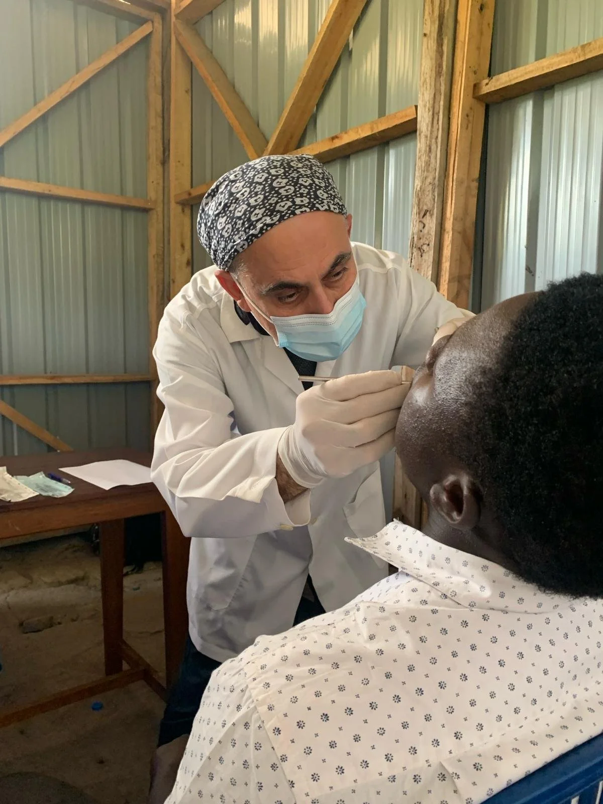Turkish dentist volunteering at Safe Haven medical camp in Africa