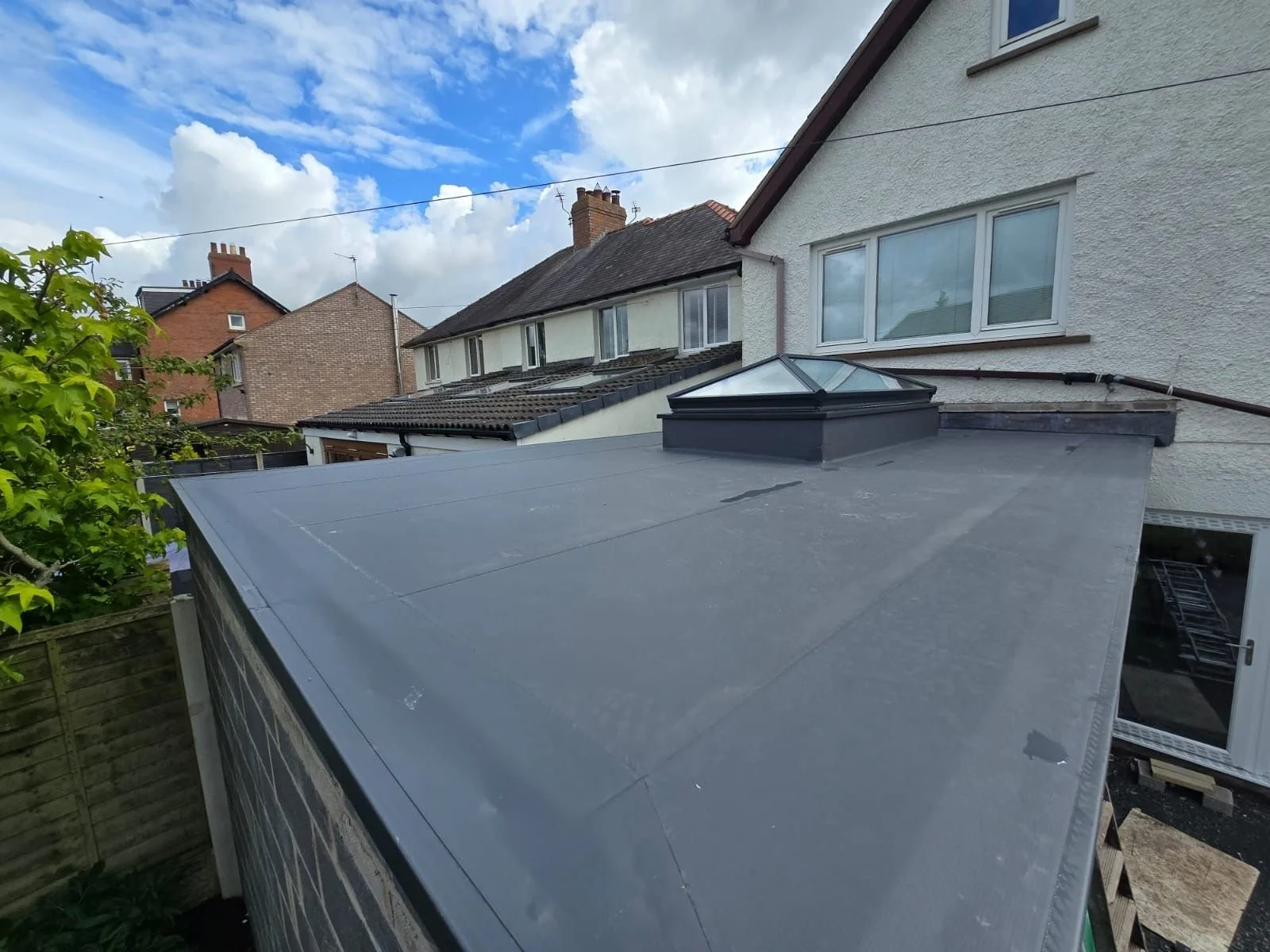 Modern architectural standing seam metal roof with crisp lines and water-shedding surface.