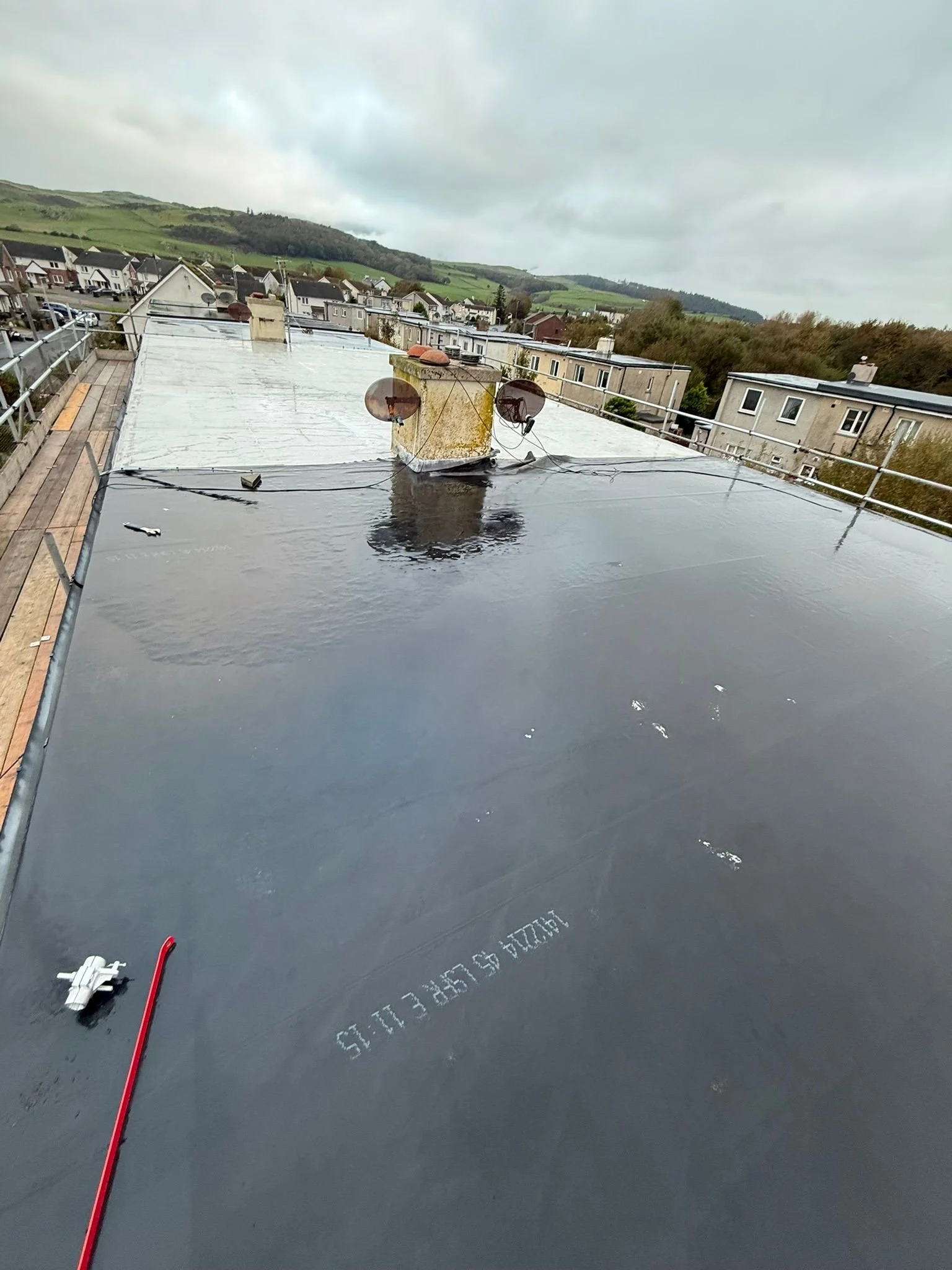 Half finished restoration of a flat roof in Cumbria