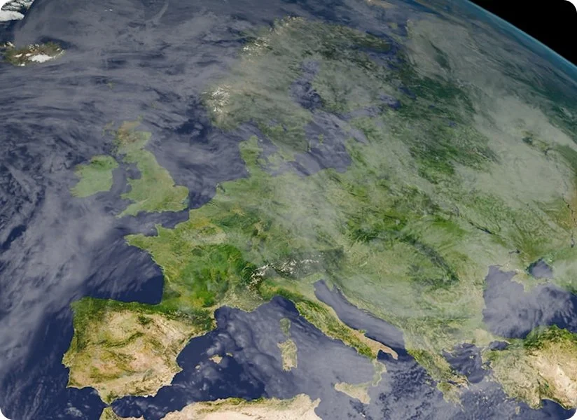 Satellite view of Europe showing landmass and cloud cover over parts of the continent.