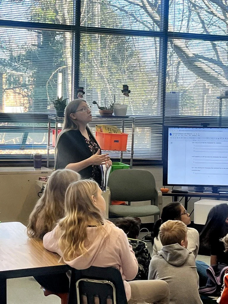 Teacher in front of children