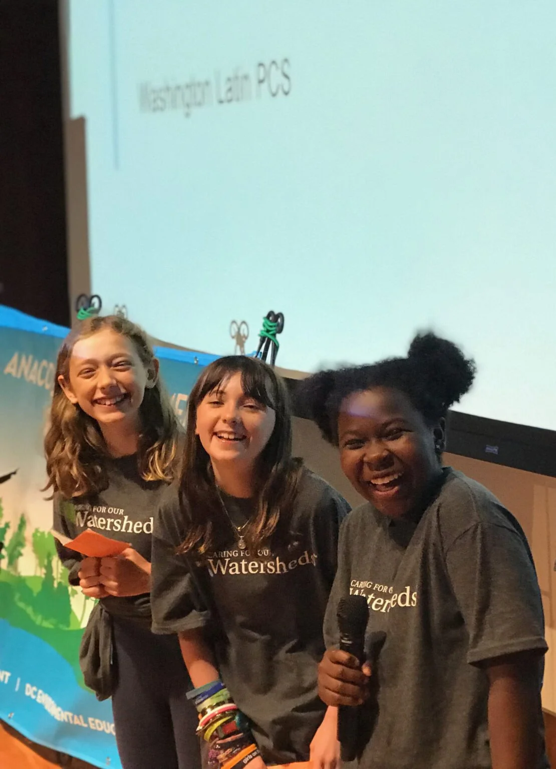 Three girls on a stage
