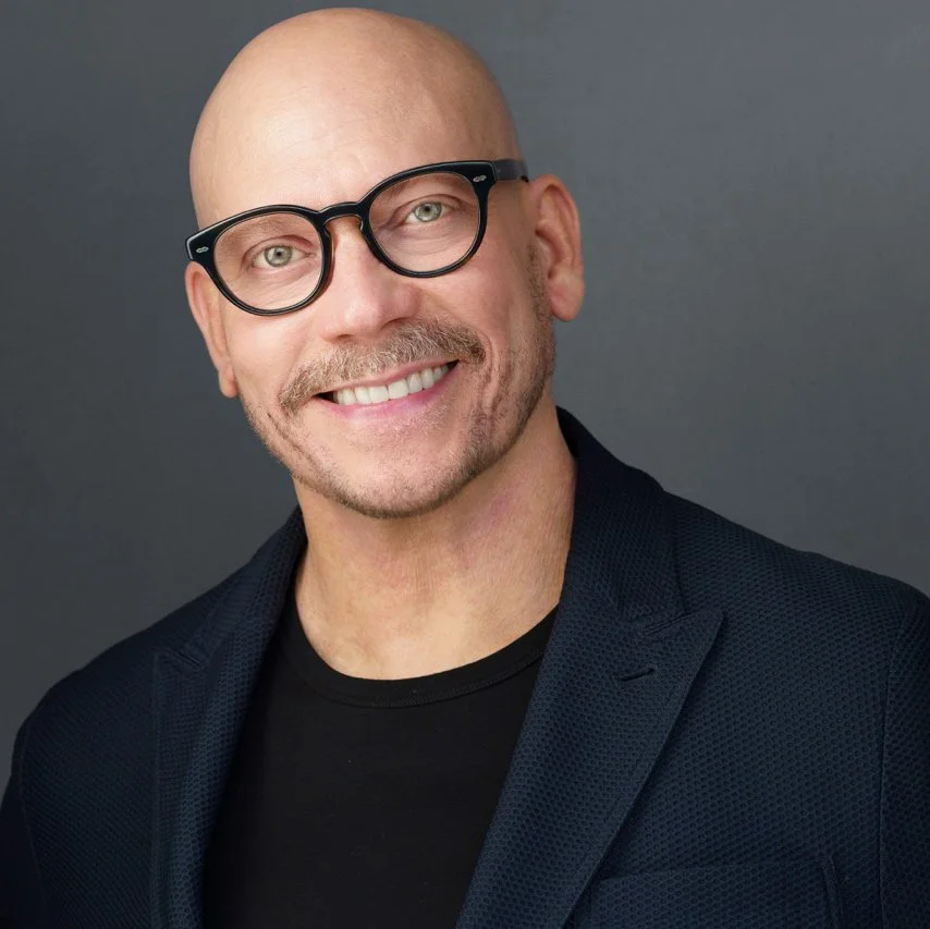 Headshot of smiling Earth Force staff member.