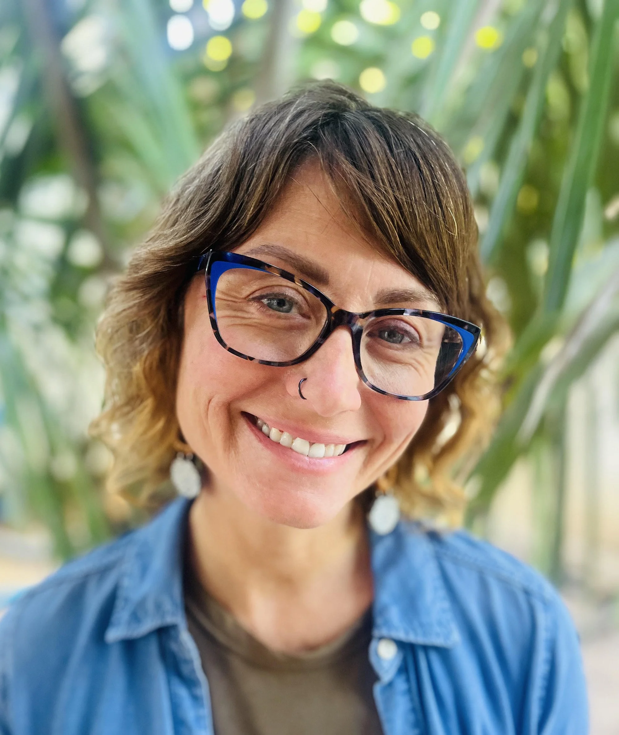 Headshot of smiling Earth Force staff member.