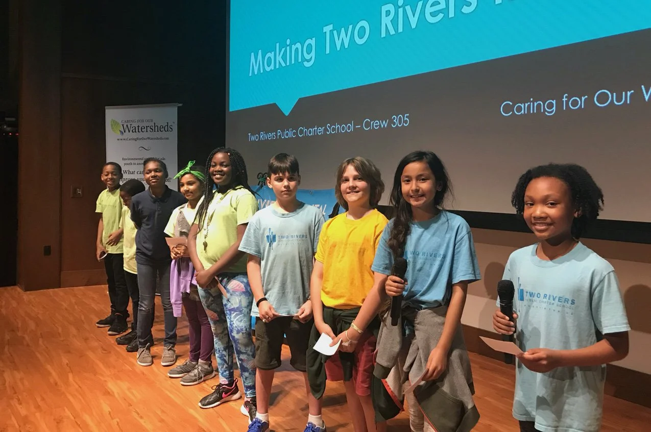Students on a stage