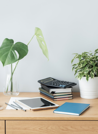 Desk with notepad and notes after a Substack coaching call