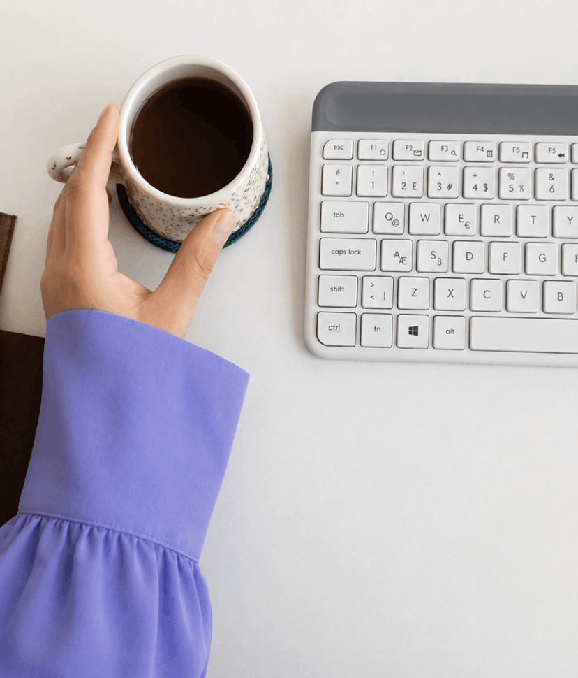 Coffee mug on a desk before a Substack coaching call