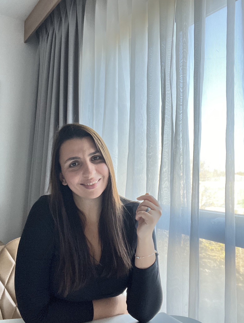 Dimka Dimitrova writing her marketing strategy and business story