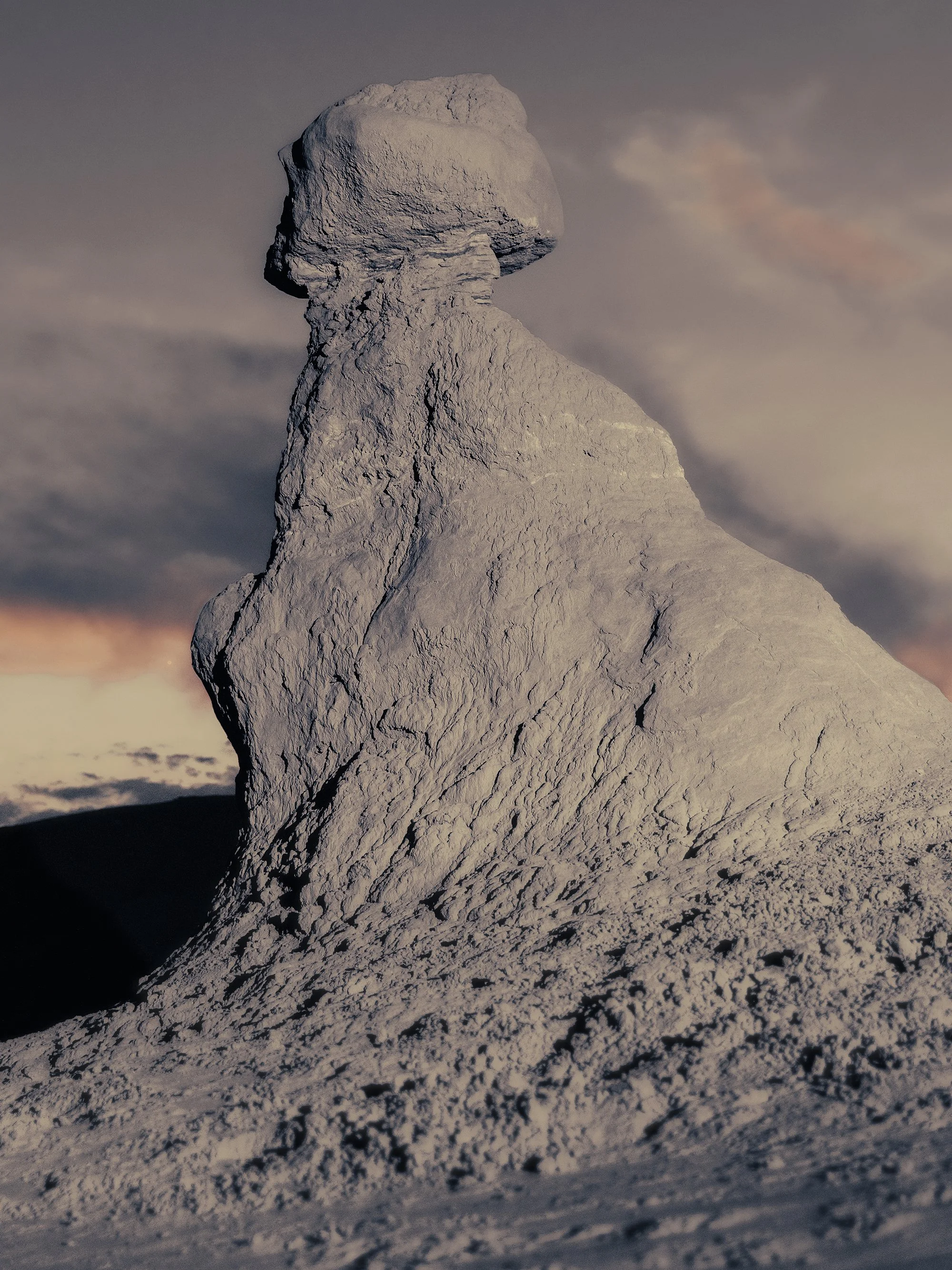 A large, weathered rock formation with a mushroom-shaped top against a cloudy sky at dusk.