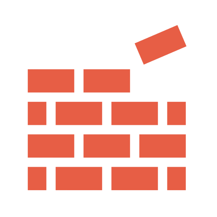A brick wall with one brick being placed or removed, and a hand holding the brick.