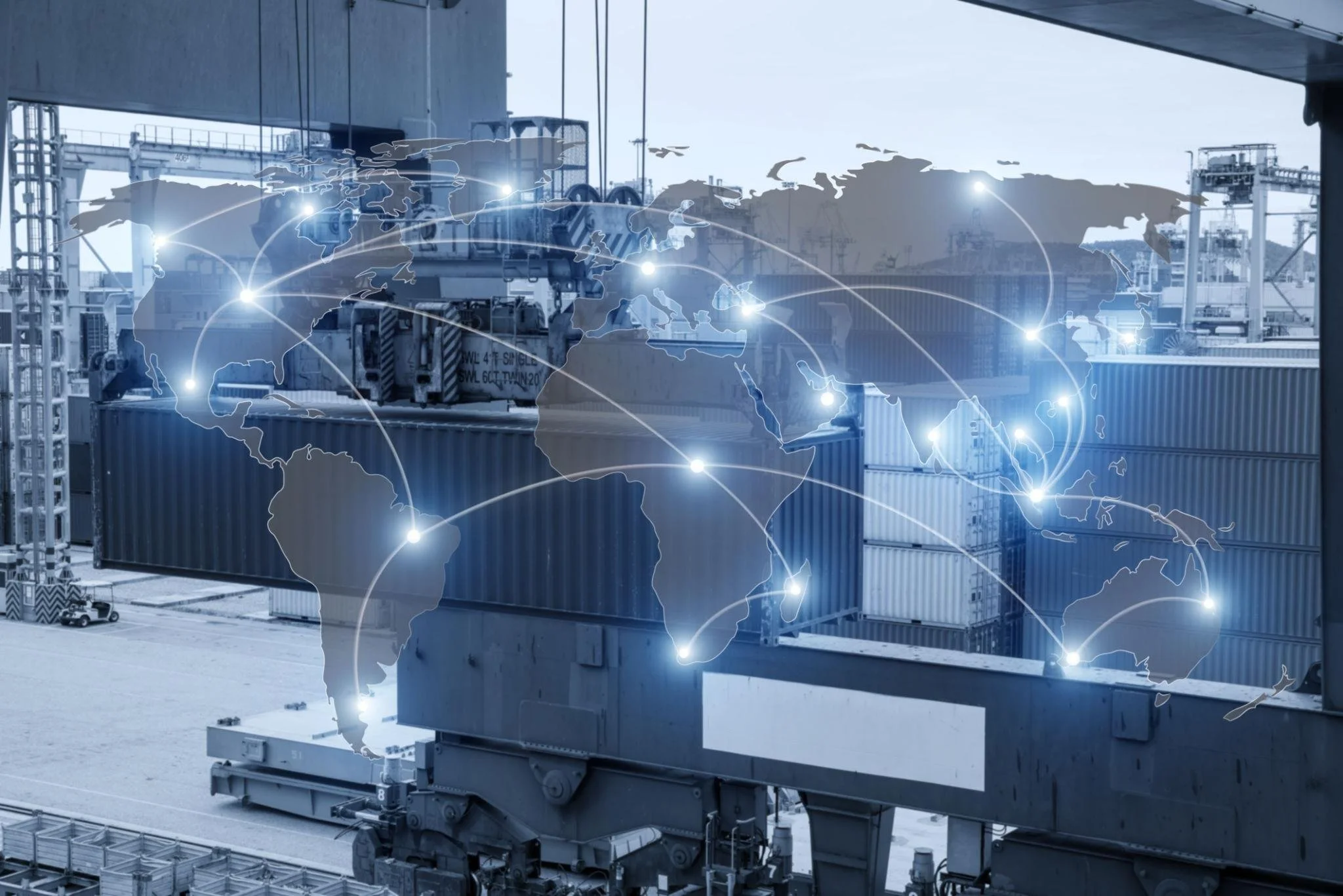 Cargo containers at a port with a digital overlay of a world map and connecting lines indicating global shipping and logistics.