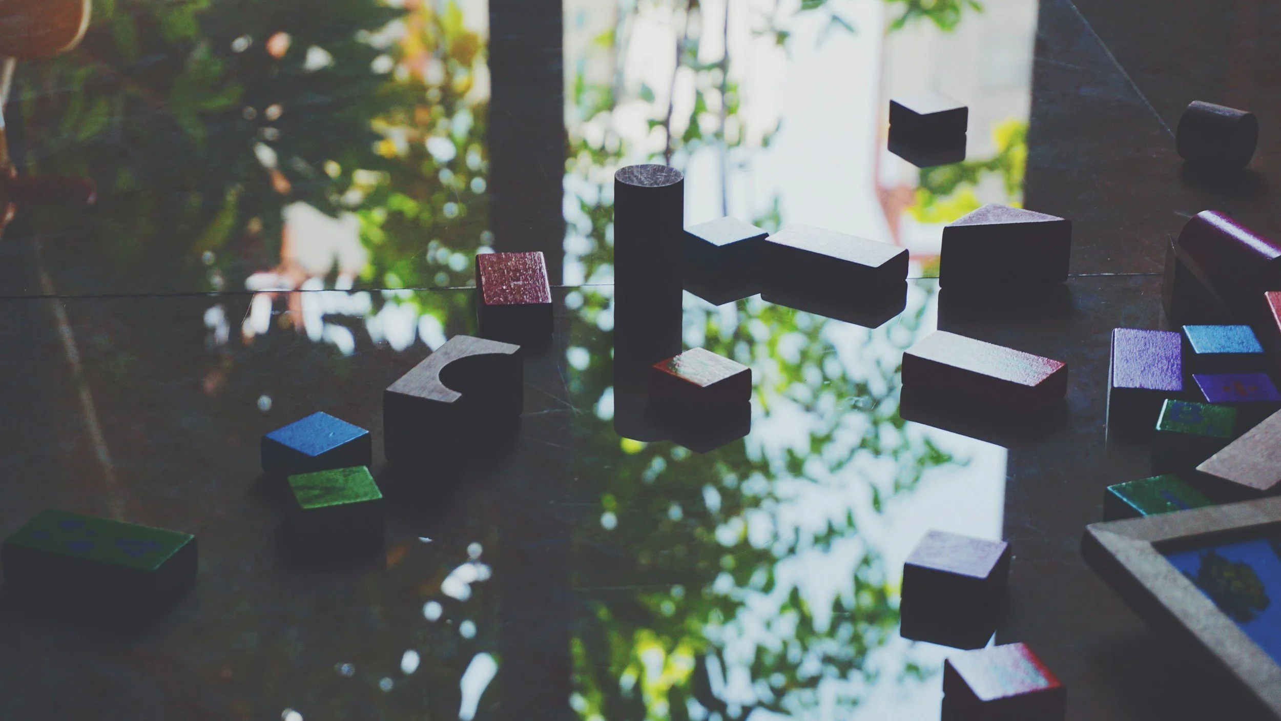 Close-up of structured geometric elements being rearranged to redesign higher education learning experiences for clarity, showcasing the CohnDriven Learning Architecture methodology