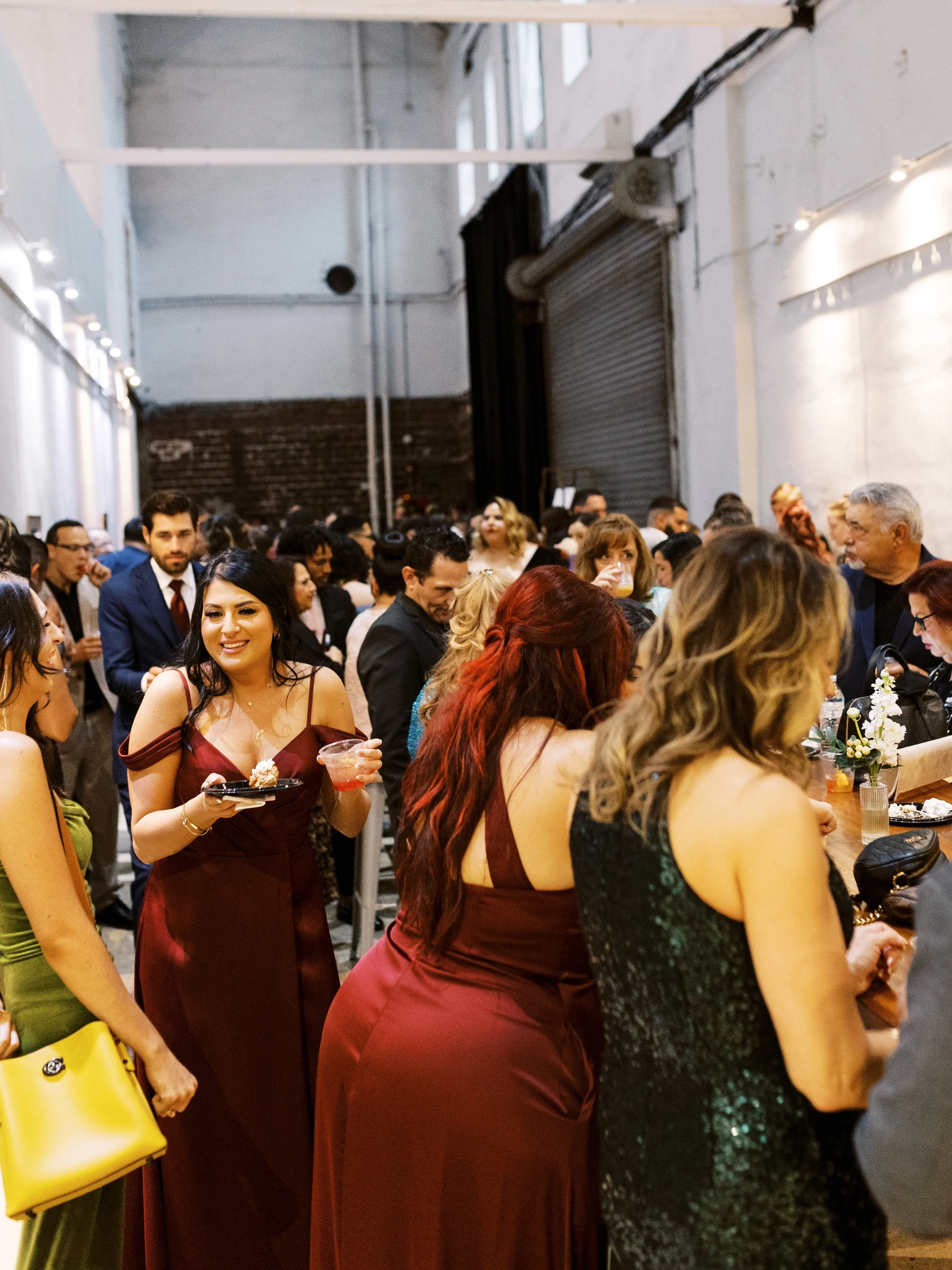 Wedding cocktail hour with guests enjoying music and refreshments provided by Total Class Entertainment