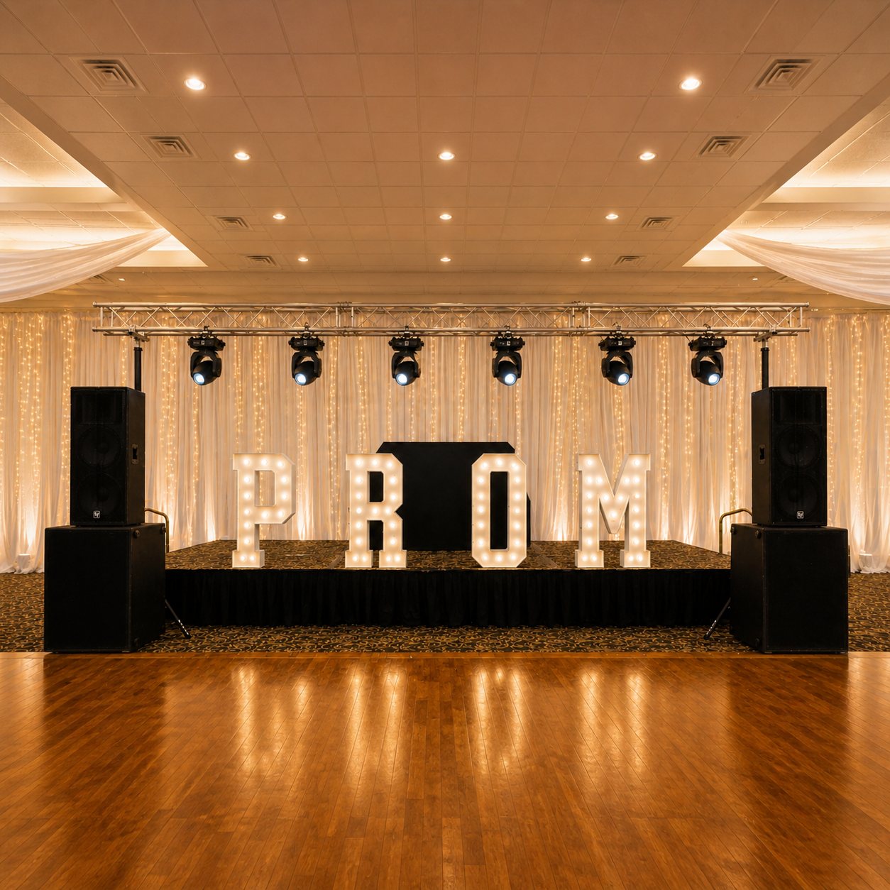 Large-scale prom production featuring DJ, sound, trussing, and moving head lighting for 500+ students at Bayanihan Arts and Events Center