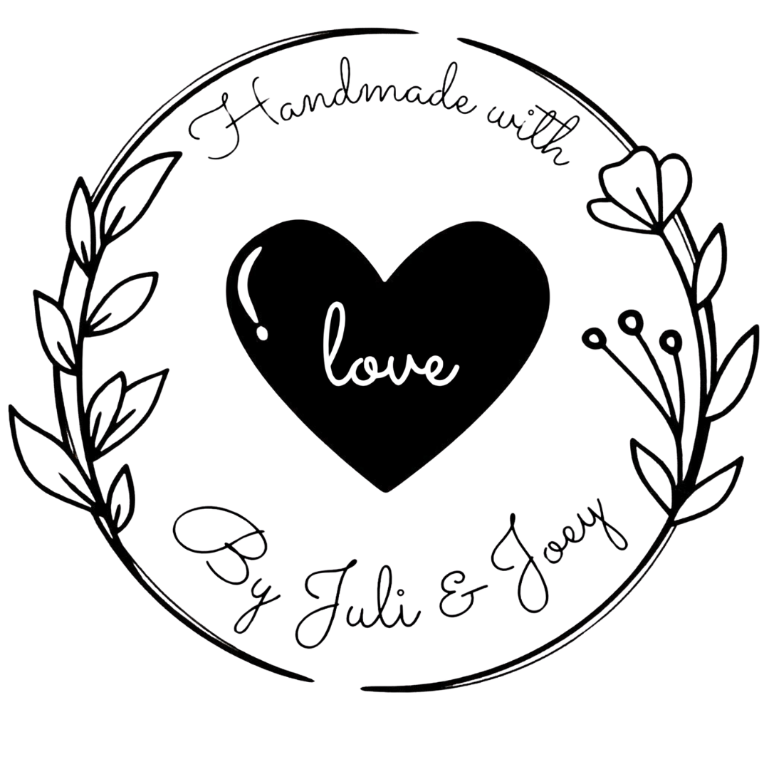 A circular design with flowers and a heart in the center, featuring the text 'Love' inside the heart and 'By Juli & Gina' at the bottom.