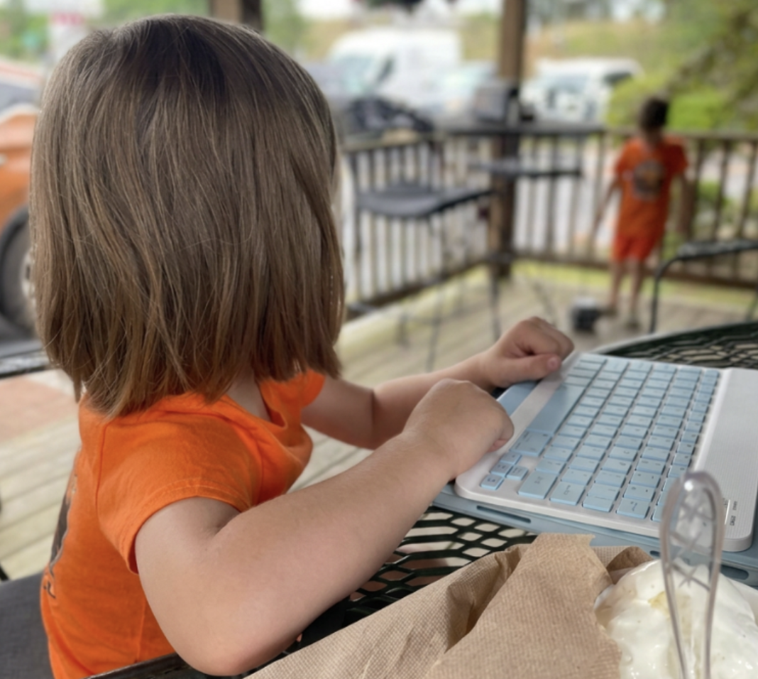 kids playing and eating ice cream in gazebo