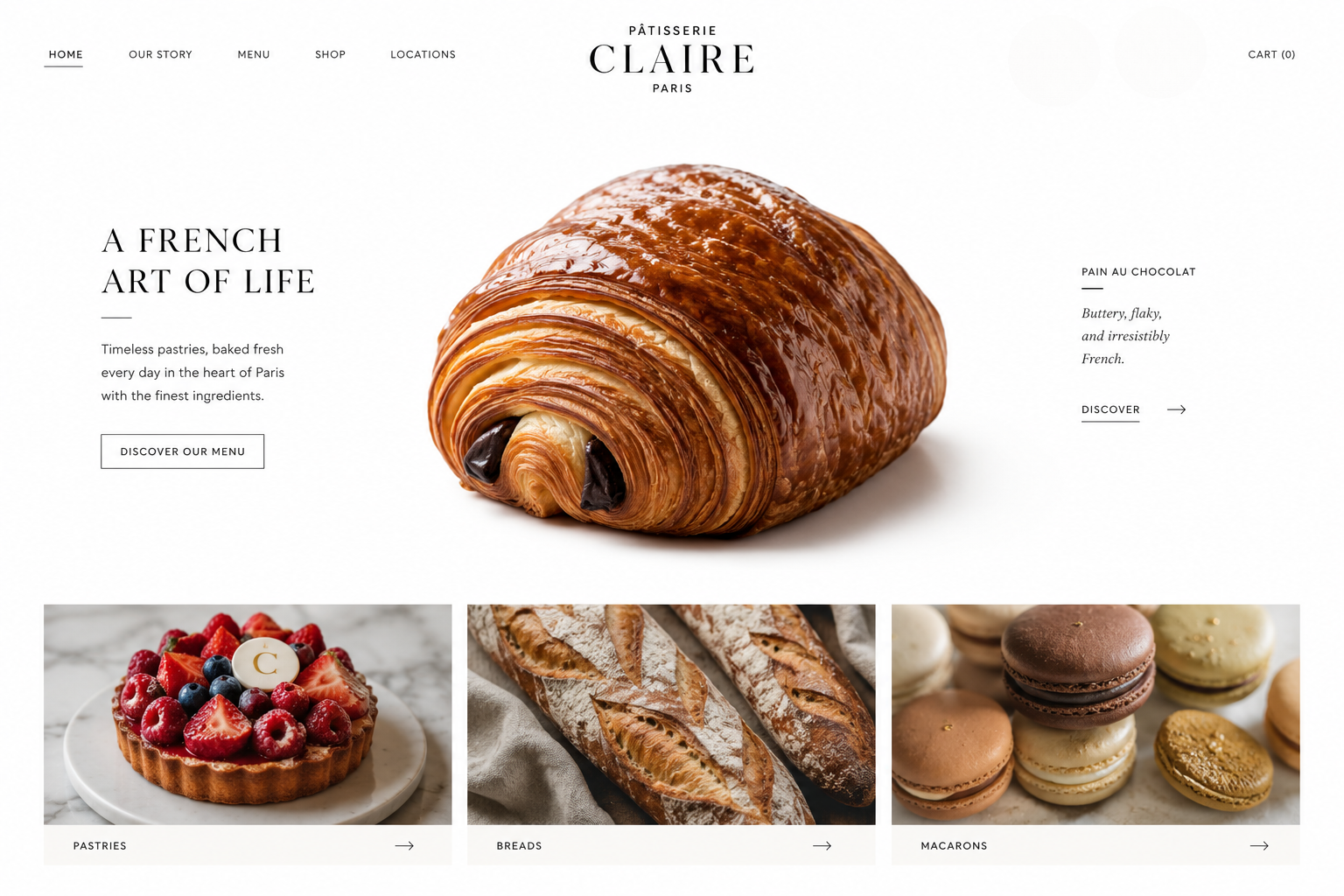 Homepage of Pâtisserie Claire Paris - a website design project by Taylor & Crowne showcasing a large image of a chocolate croissant and smaller images of a fruit tart, baguettes, and macarons, with text highlighting French pastries.