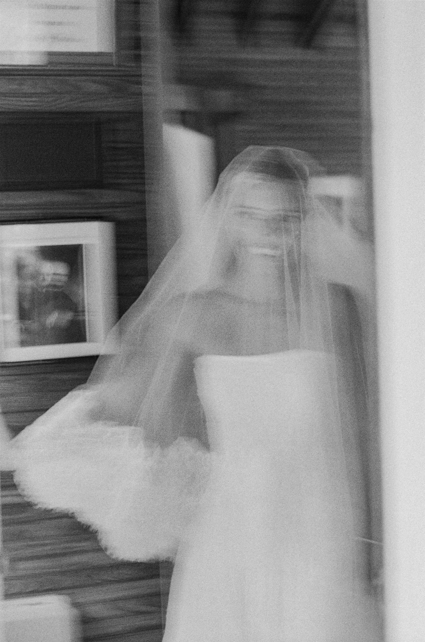 blurred imagery of a bride in a veil; shot on film photography