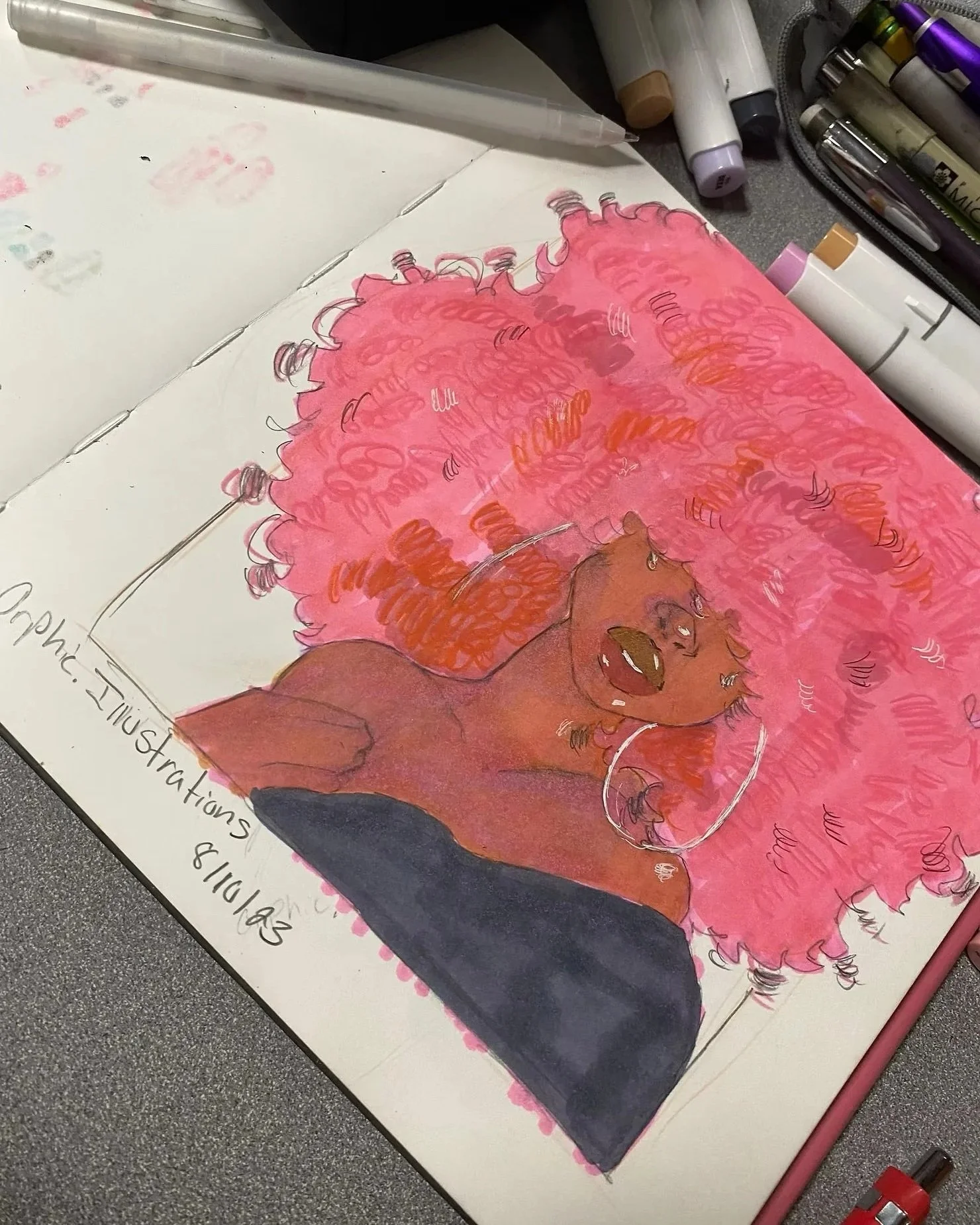 A colorful illustration of a woman with curly pink hair, earrings, and dark clothing on paper, surrounded by markers and art supplies.