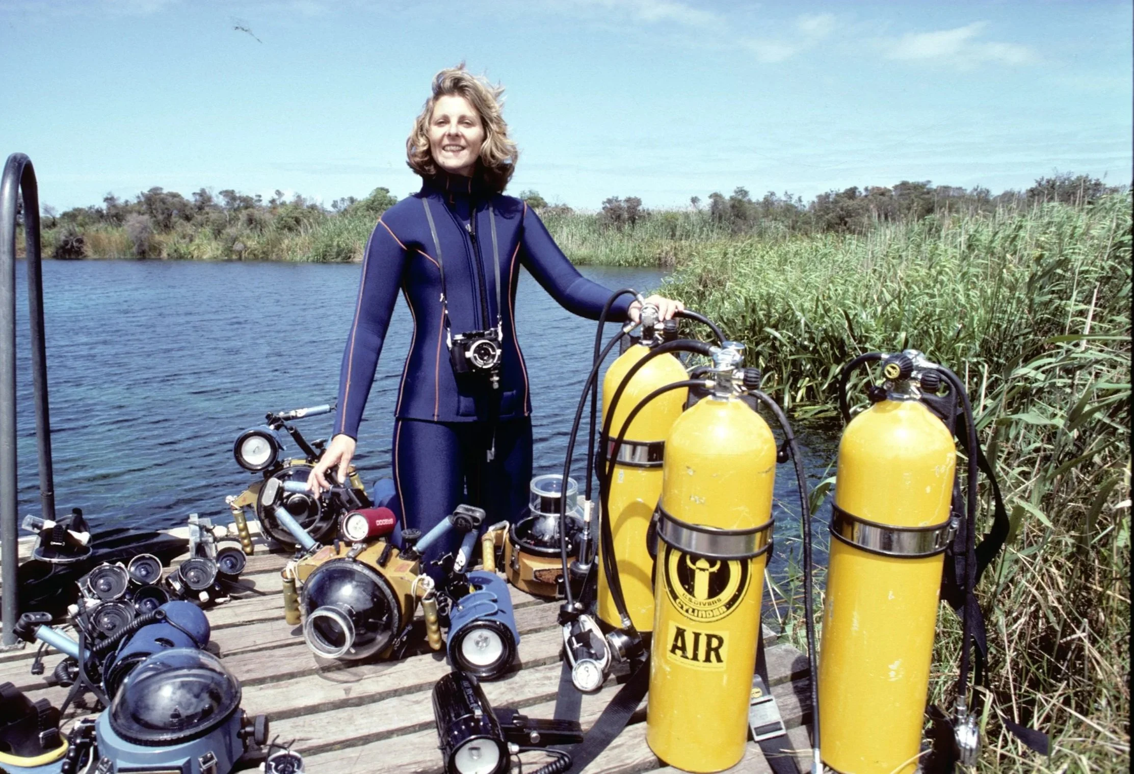 AUSTRALIA Anne with gear on dock at Piccaninnie Ponds    