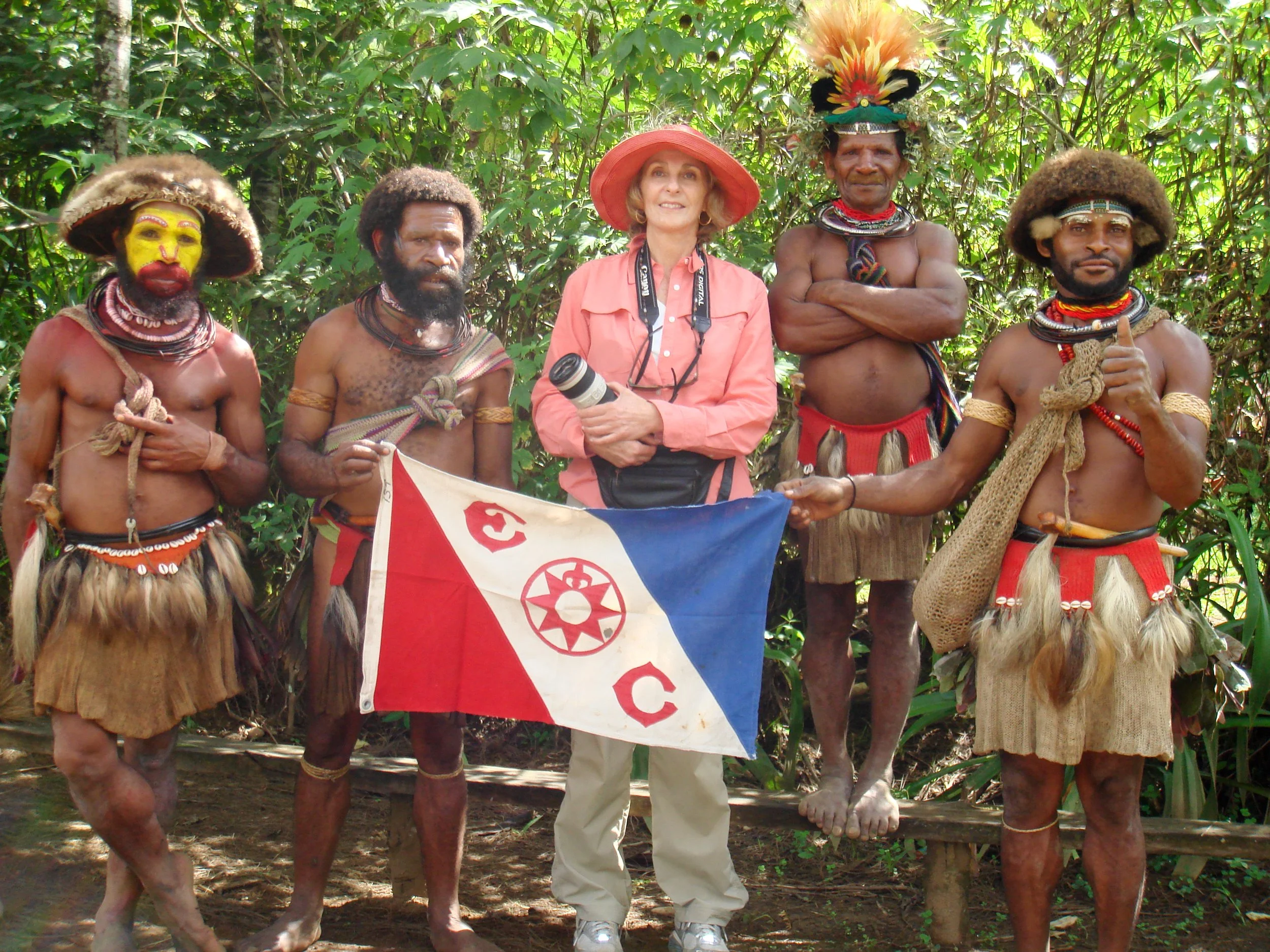 PNG Huli Wigmen in all their finery wanted to touch Explorers Club Flag  