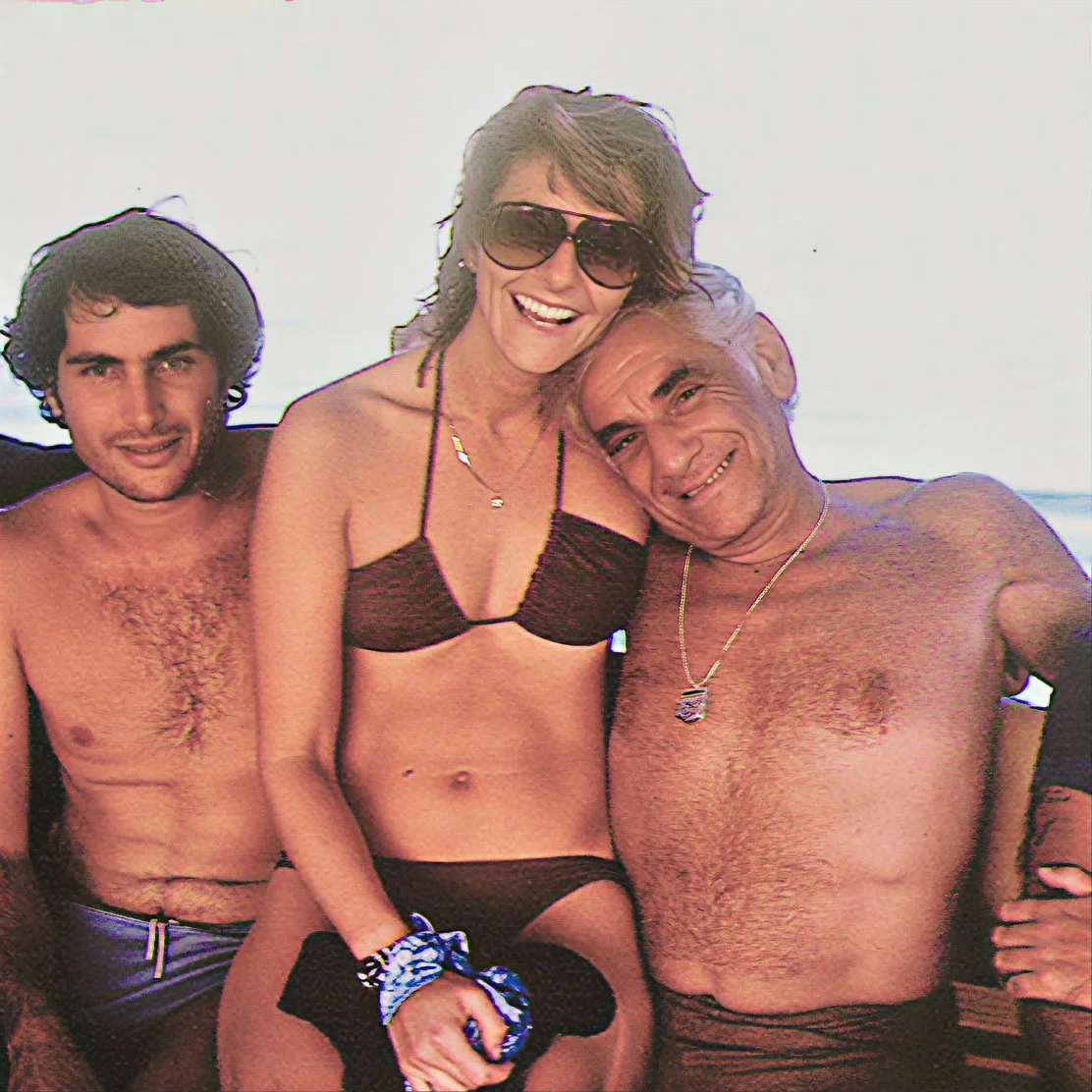 RED SEA Anne on the lap of Maestro Leonard Bernstein next to Agadi, Israeli dive guide 
