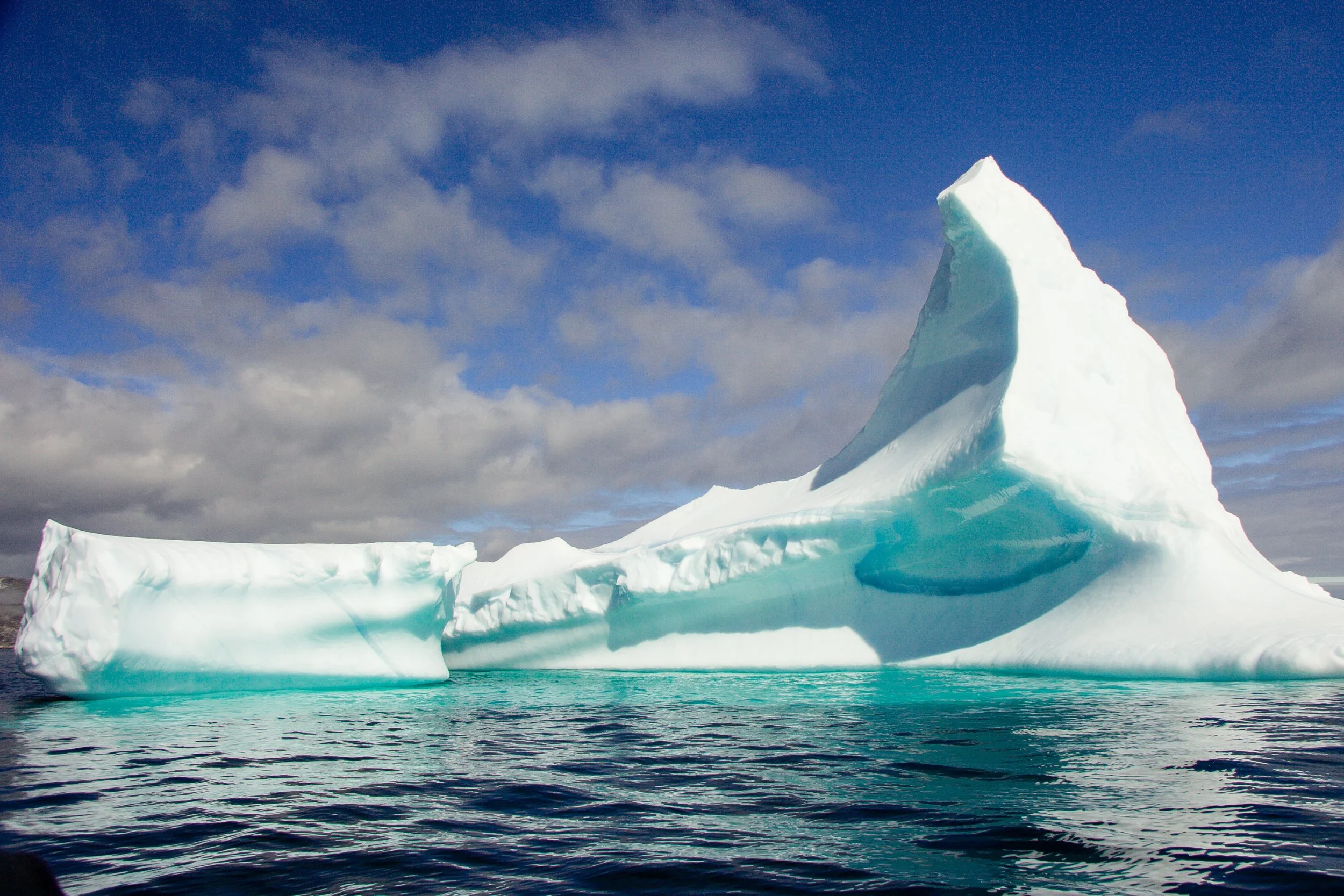 ARCTIC melting iceberg in Butterfly Bay hollowed out by warming climate