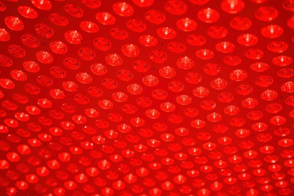 Close-up of red LED lights arranged in a grid pattern.