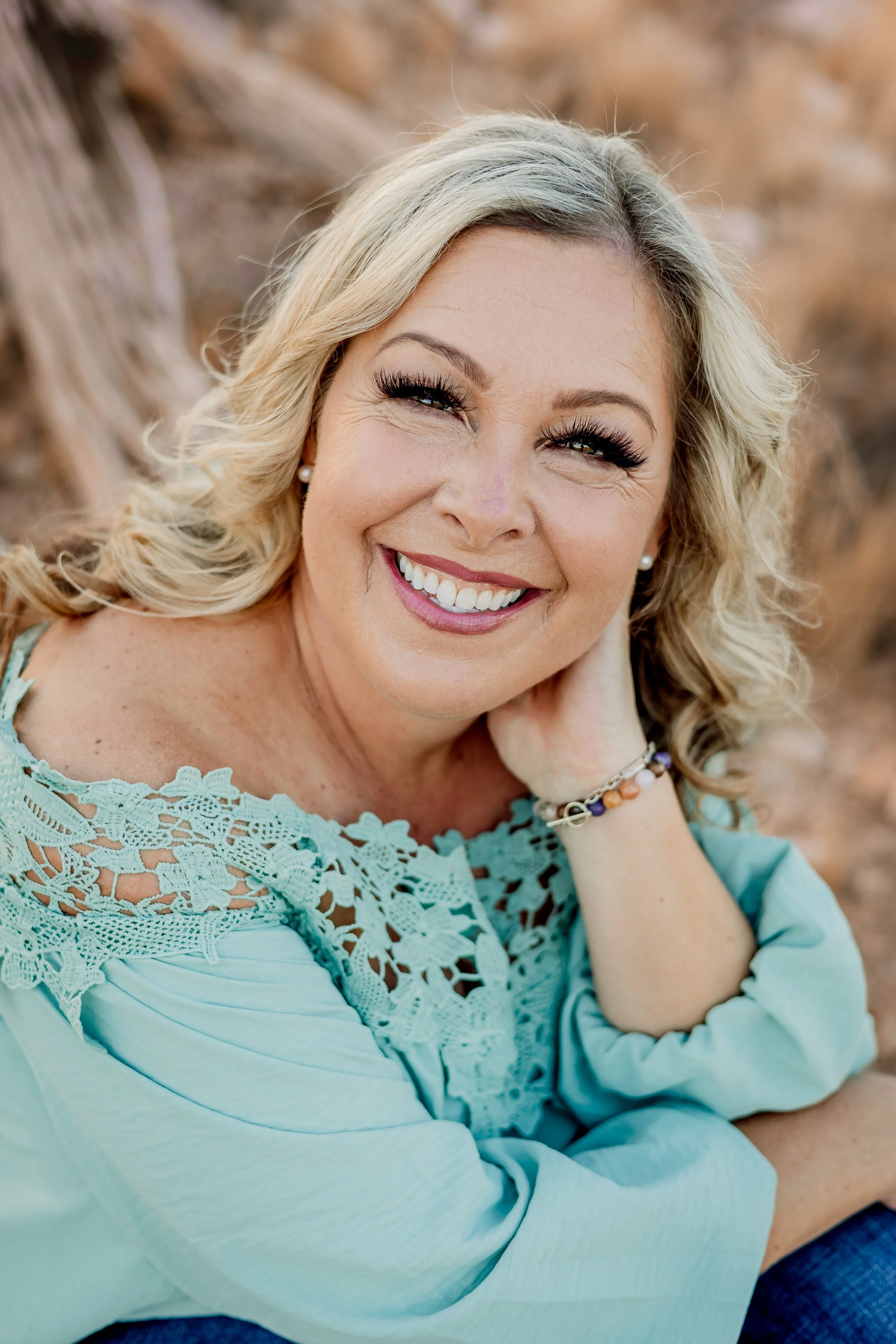 Amy Summers, founder of Awareness with Amy, smiling outdoors
