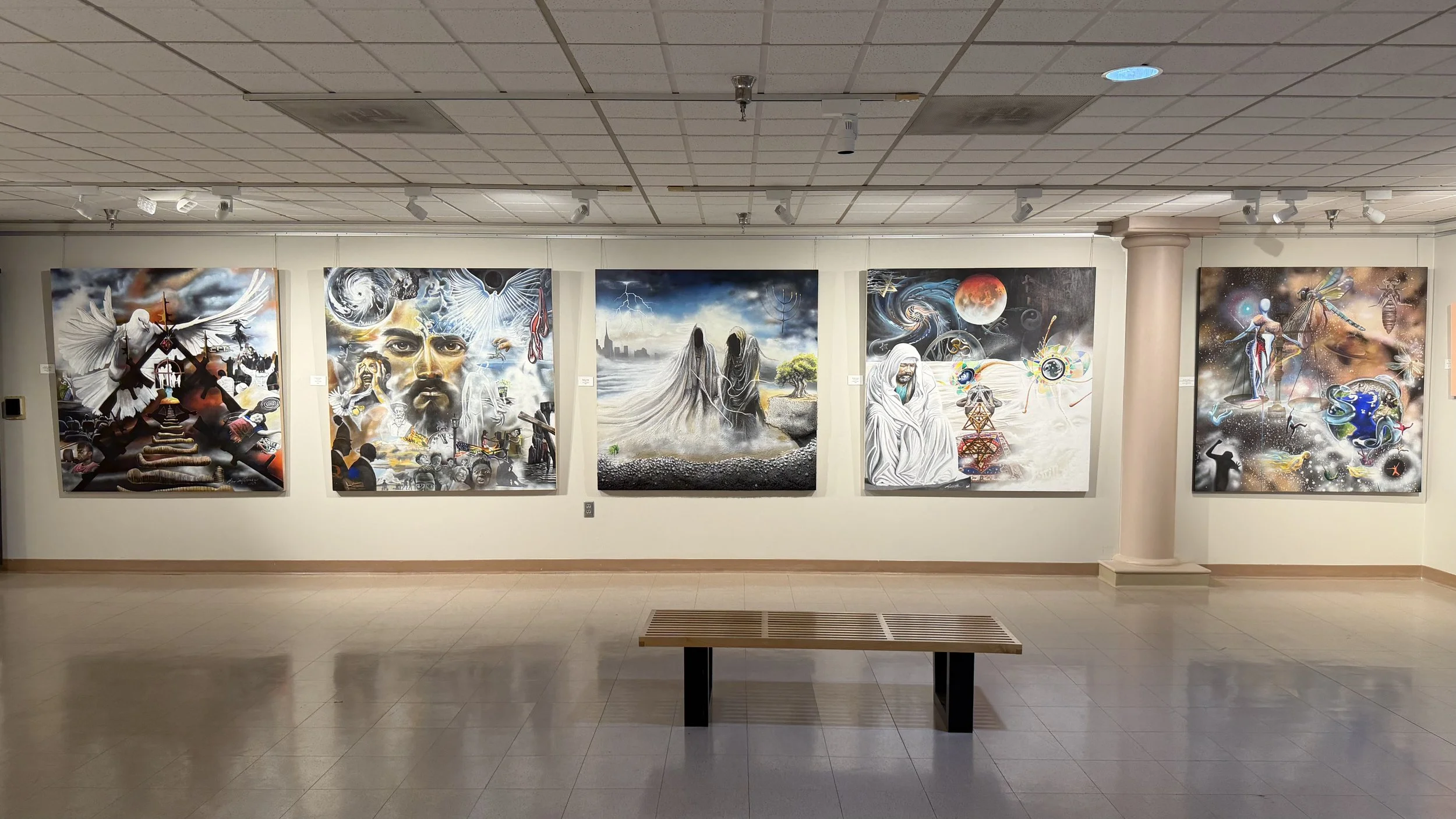 Rotating exhibit of large-scale paintings on display in the gallery at the Bruce R. Watkins Cultural Heritage Center