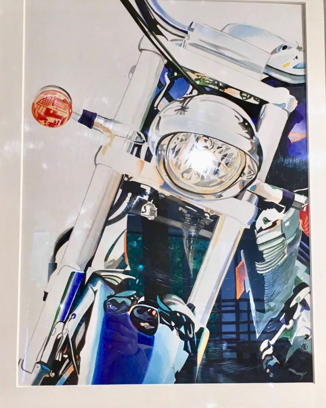 Abstract painting of a motorcycle's front view showing the handlebars, headlight, and front fork with vivid colors and stylized details.