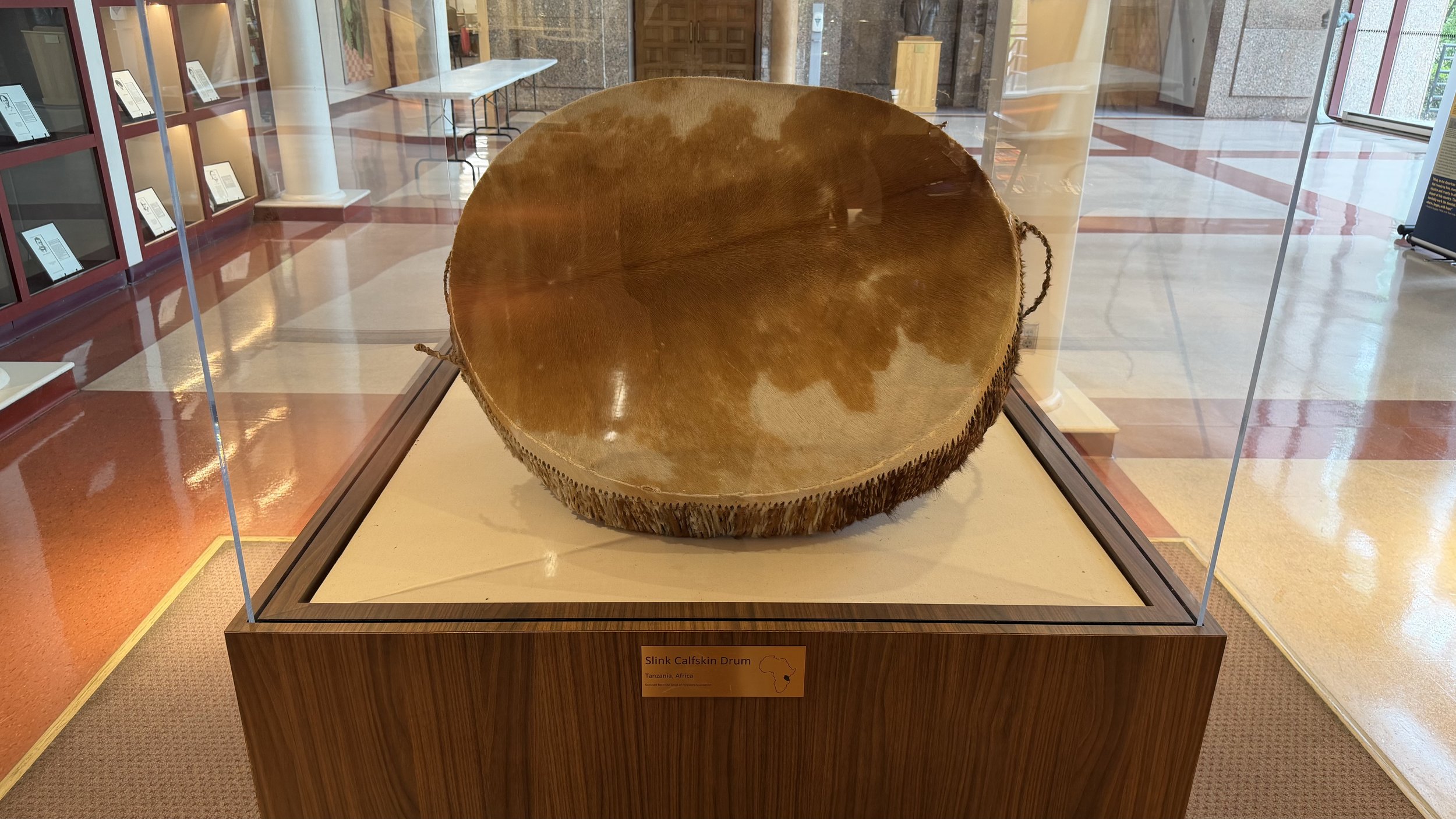 Historical artifact displayed in a glass case as part of the permanent collection at the Bruce R. Watkins Cultural Heritage Center