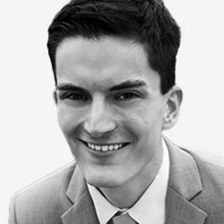 Black and white headshot Colin Tessier.