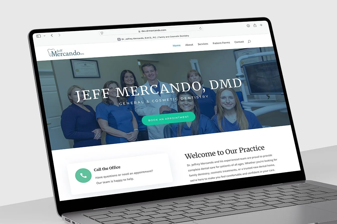 Laptop displaying Dr. Jeff Mercando's dental practice website, featuring the staff group photo, logo, and contact info.