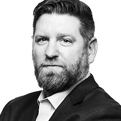 Black and white portrait of Shane Hickey.
