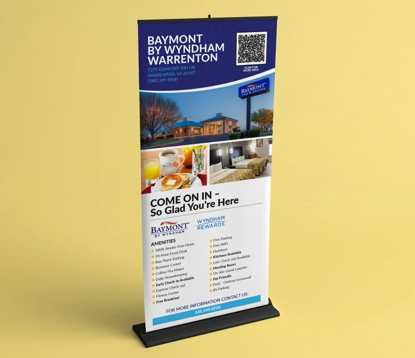 Promotional banner for Baymont by Wyndham Warrenton featuring images of the hotel exterior, breakfast, and a hotel room, with contact information and list of amenities.