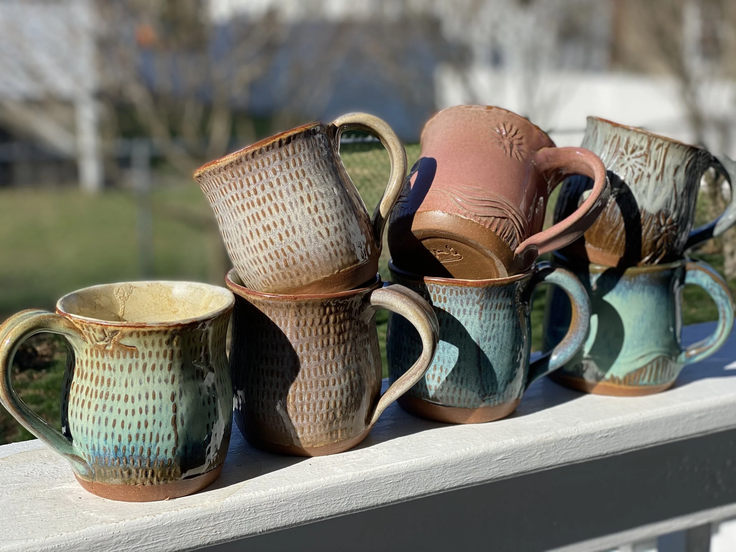 Mugs stacked in the sun.jpg