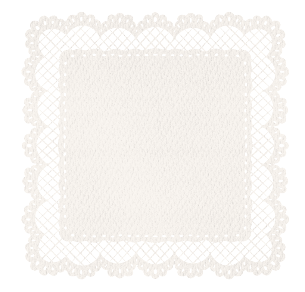 White decorative paper doily with a lace-like pattern and a solid center, set against a black background.