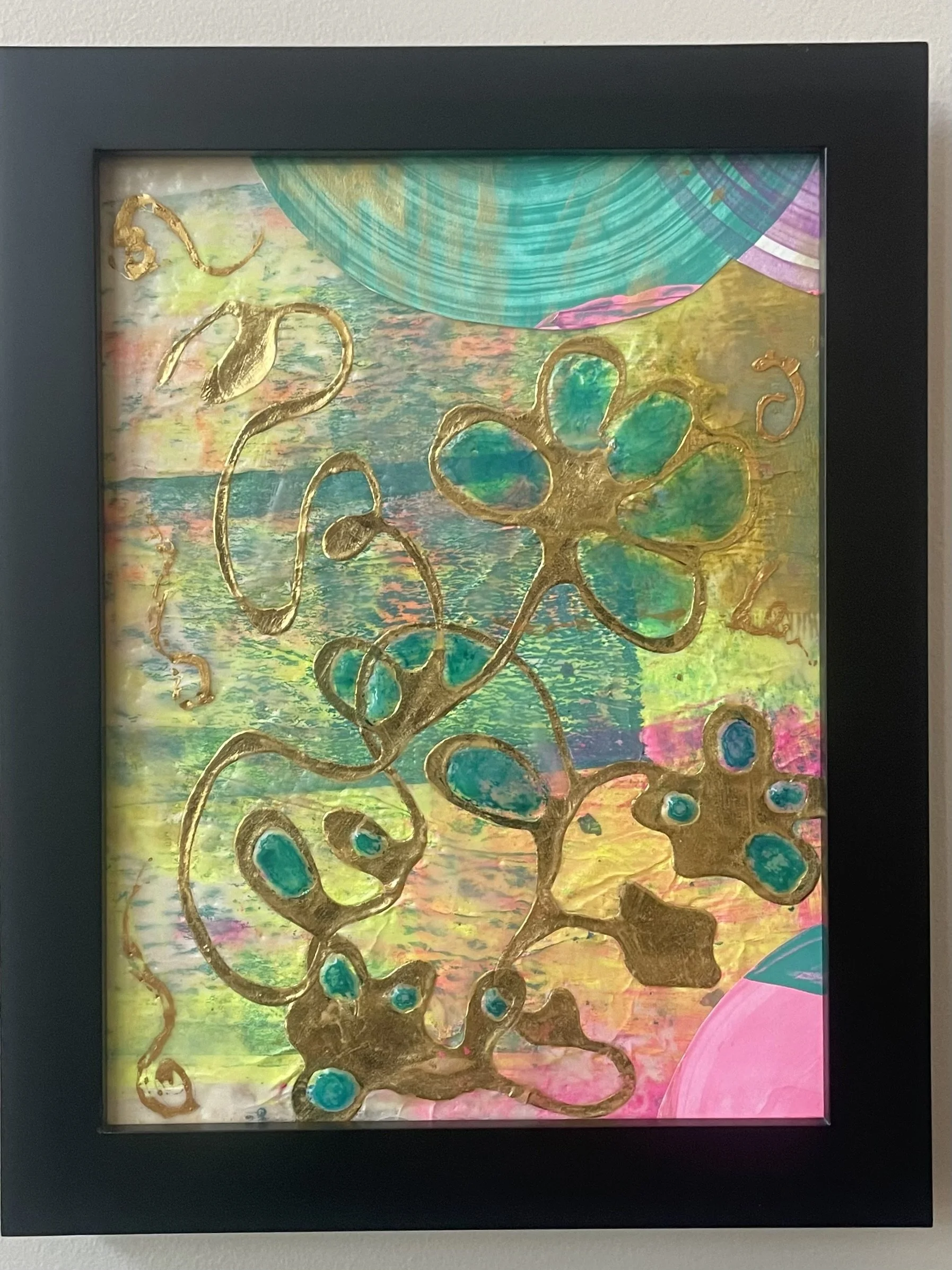 Encaustic mixed media with gold flowing floral pattern on an abstract fluorescent background.