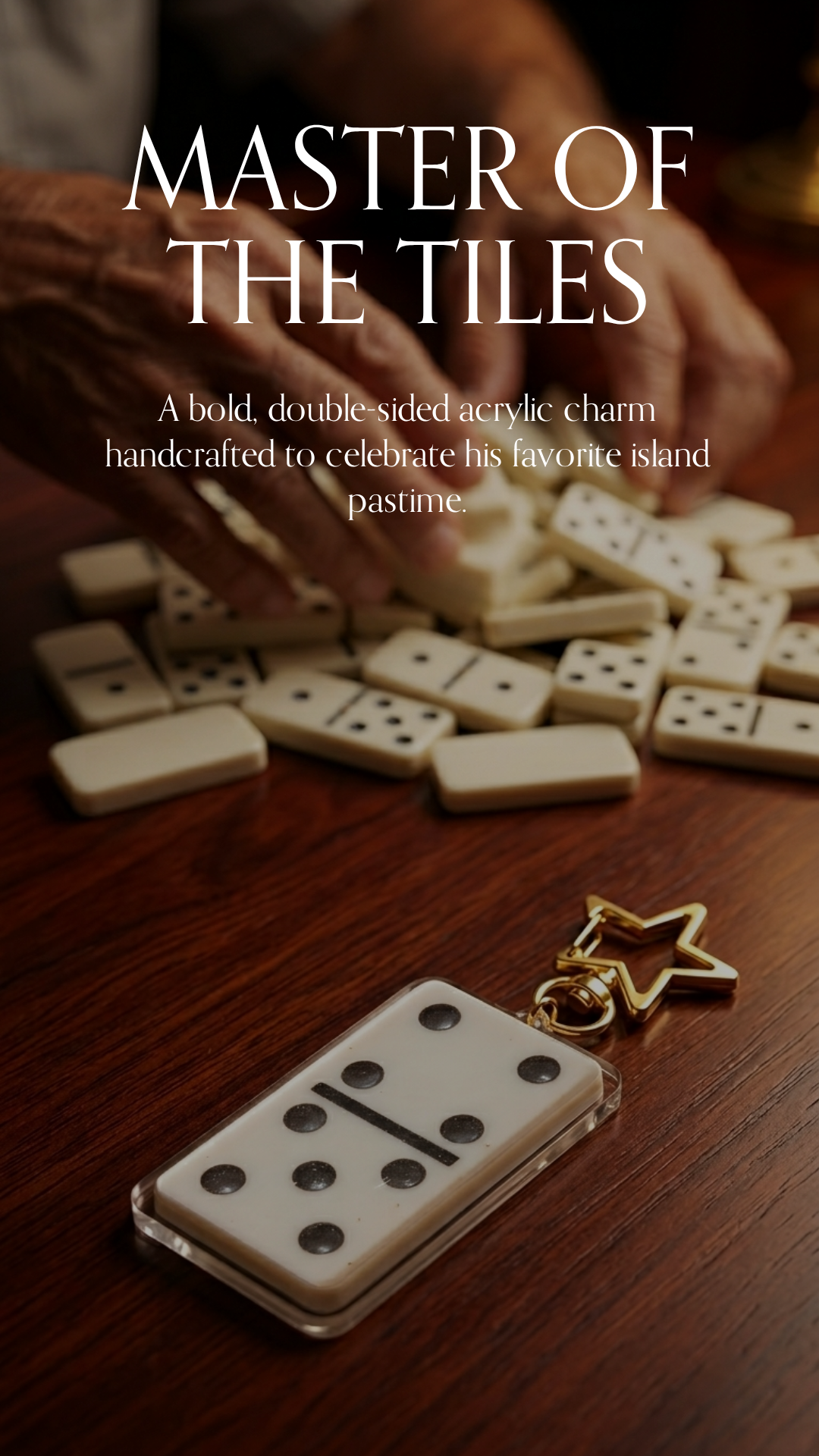 Close-up of a person arranging white dominoes with black dots and a star-shaped keychain on a wooden surface.