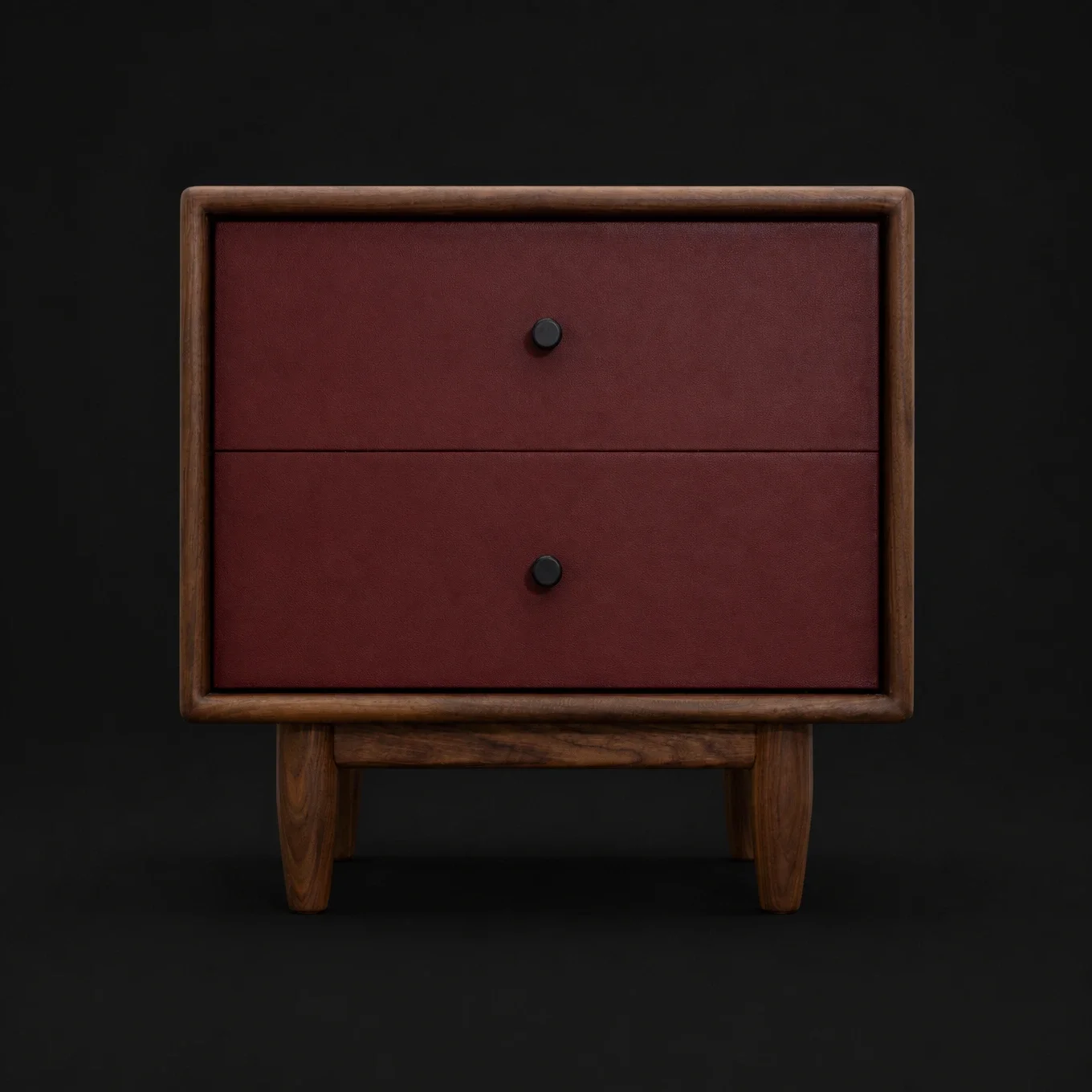 A mid-century modern wooden nightstand with two drawers, dark red fronts, black knobs, and four angled legs against a black background.