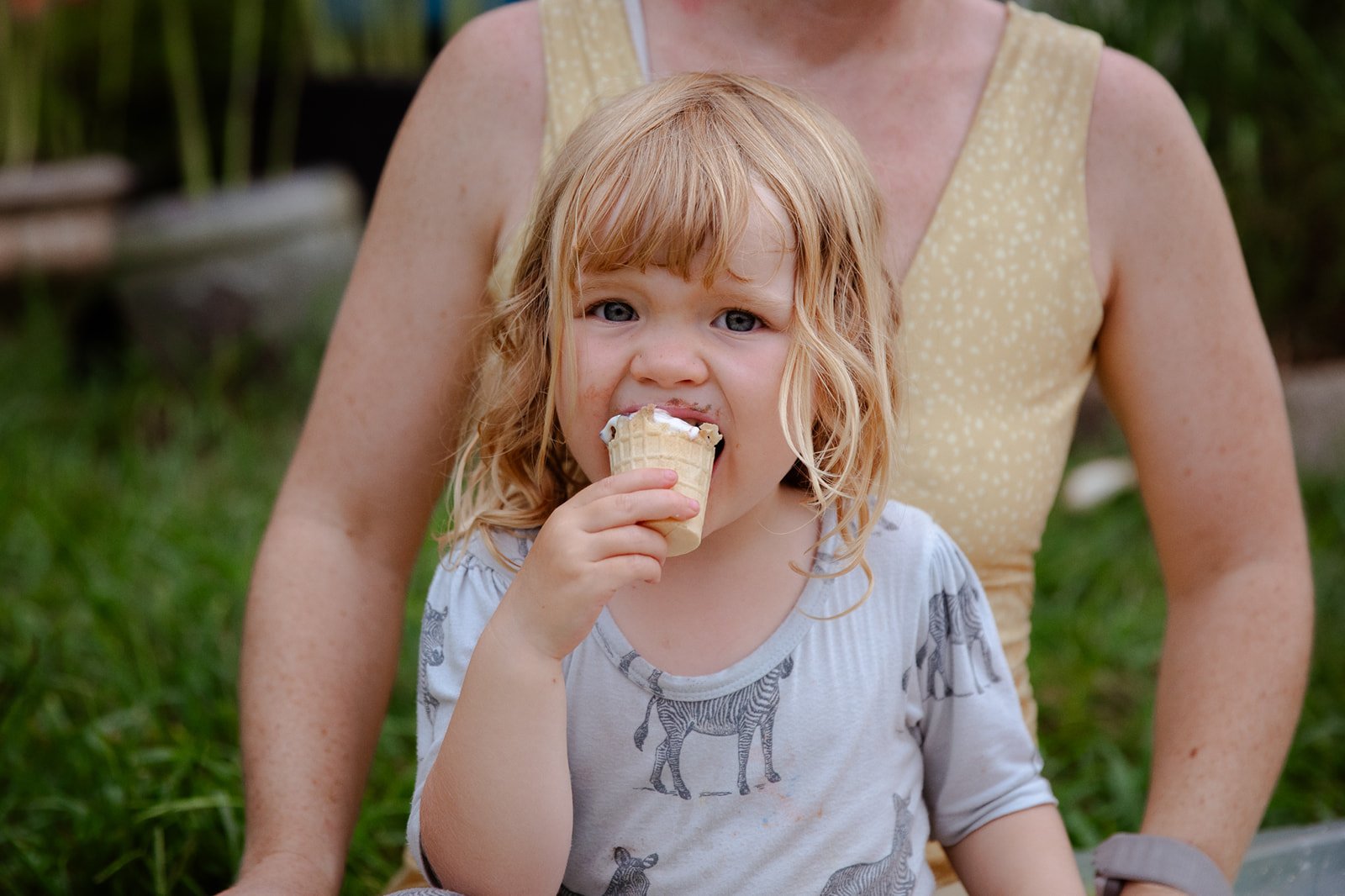 Little girl eating icecream photograph