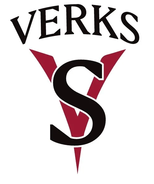 The image features the word 'VERKS' at the top, with a large stylized letter 'S' in the center. The 'S' is black with red accents, and behind it is a red arrow pointing downward. The overall design suggests a logo or emblem.
