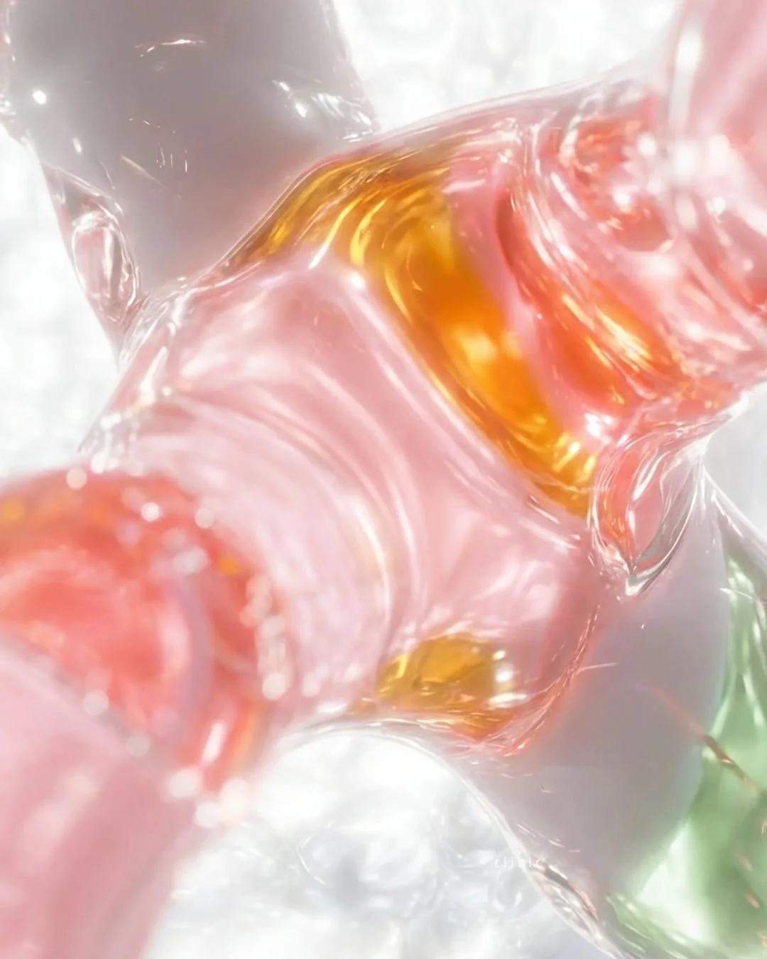 Close-up view of colorful glass marbles with pink, orange, and green swirls.